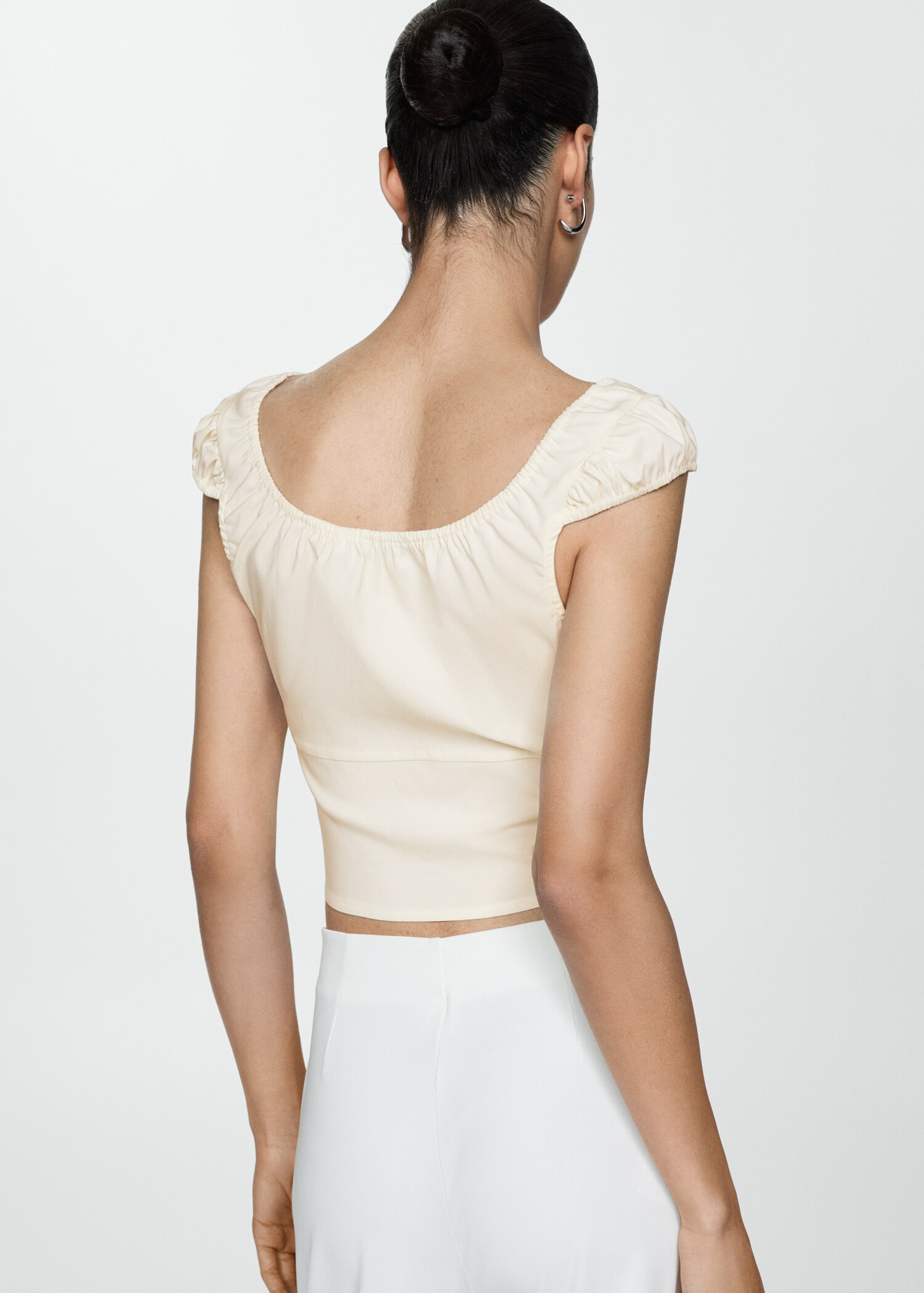Crop Top mit Knöpfen - Rückseite des Artikels