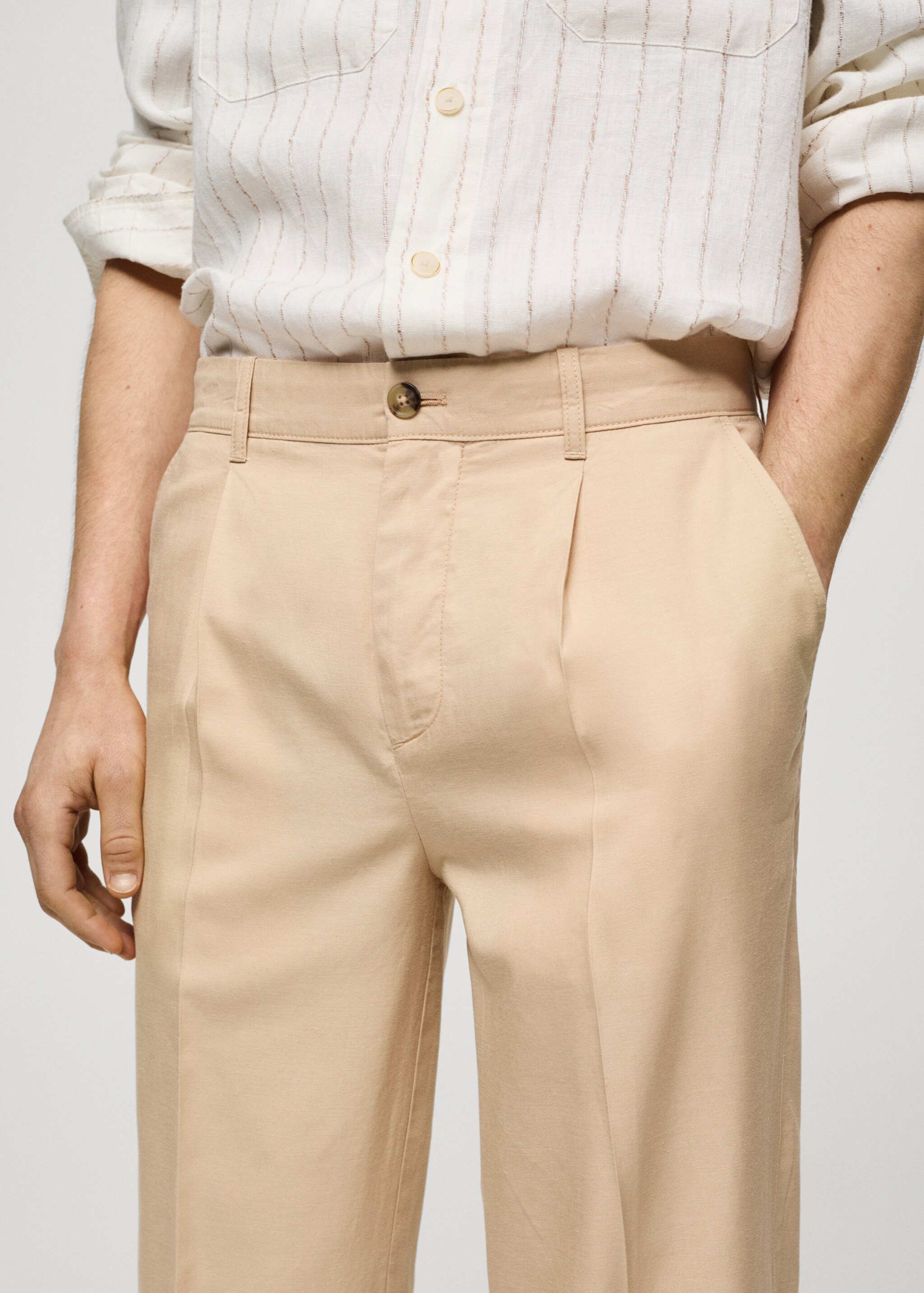 Bundfaltenhose aus Lyocell mit Baumwolle - Detail des Artikels 1, Vanille. Ref: 77070562-00.