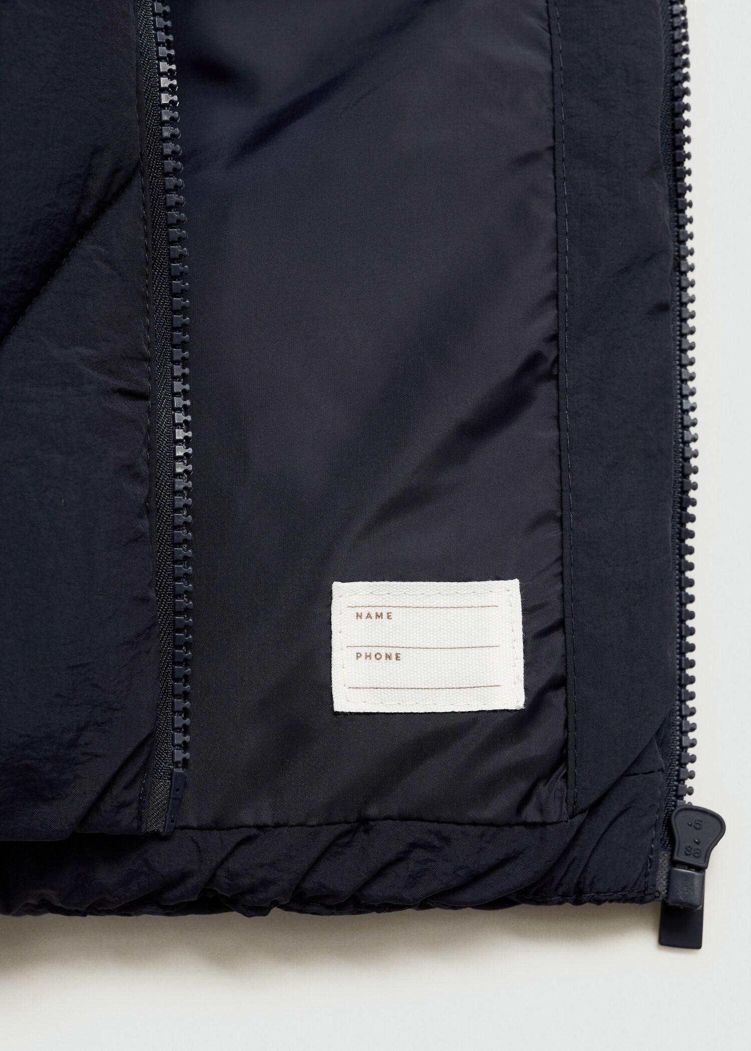 Quilted vest with pockets - Details of the article 0