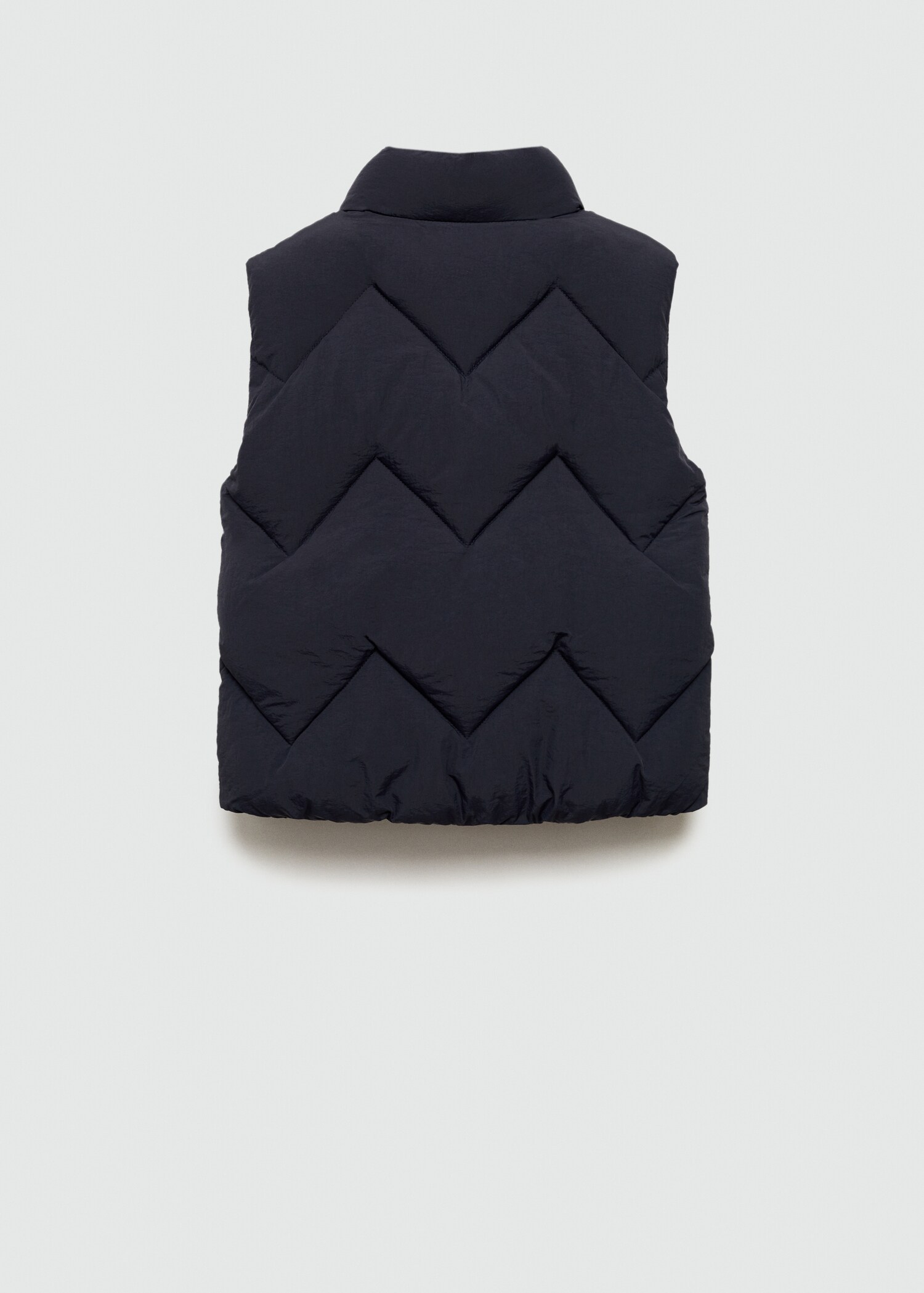 Quilted vest with pockets - Reverse of the article