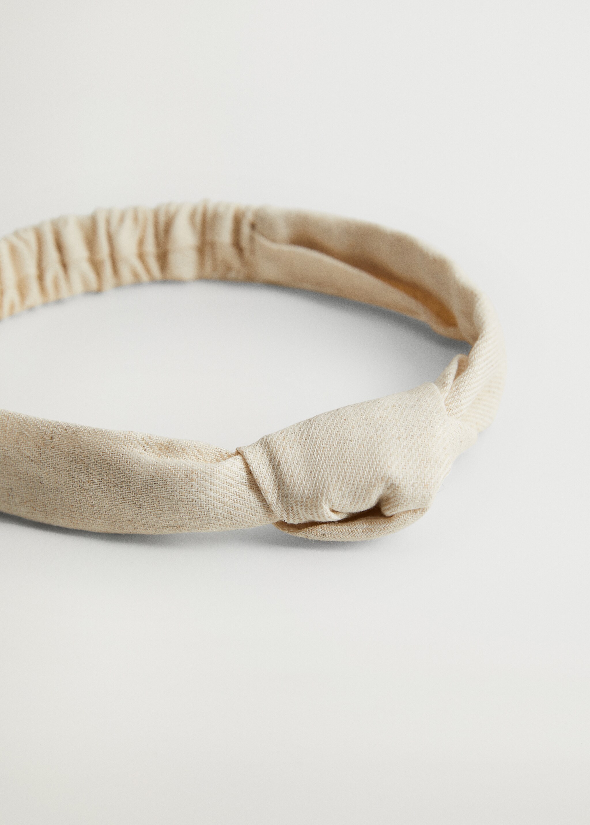 Diadema textura nudo  - Plano medio