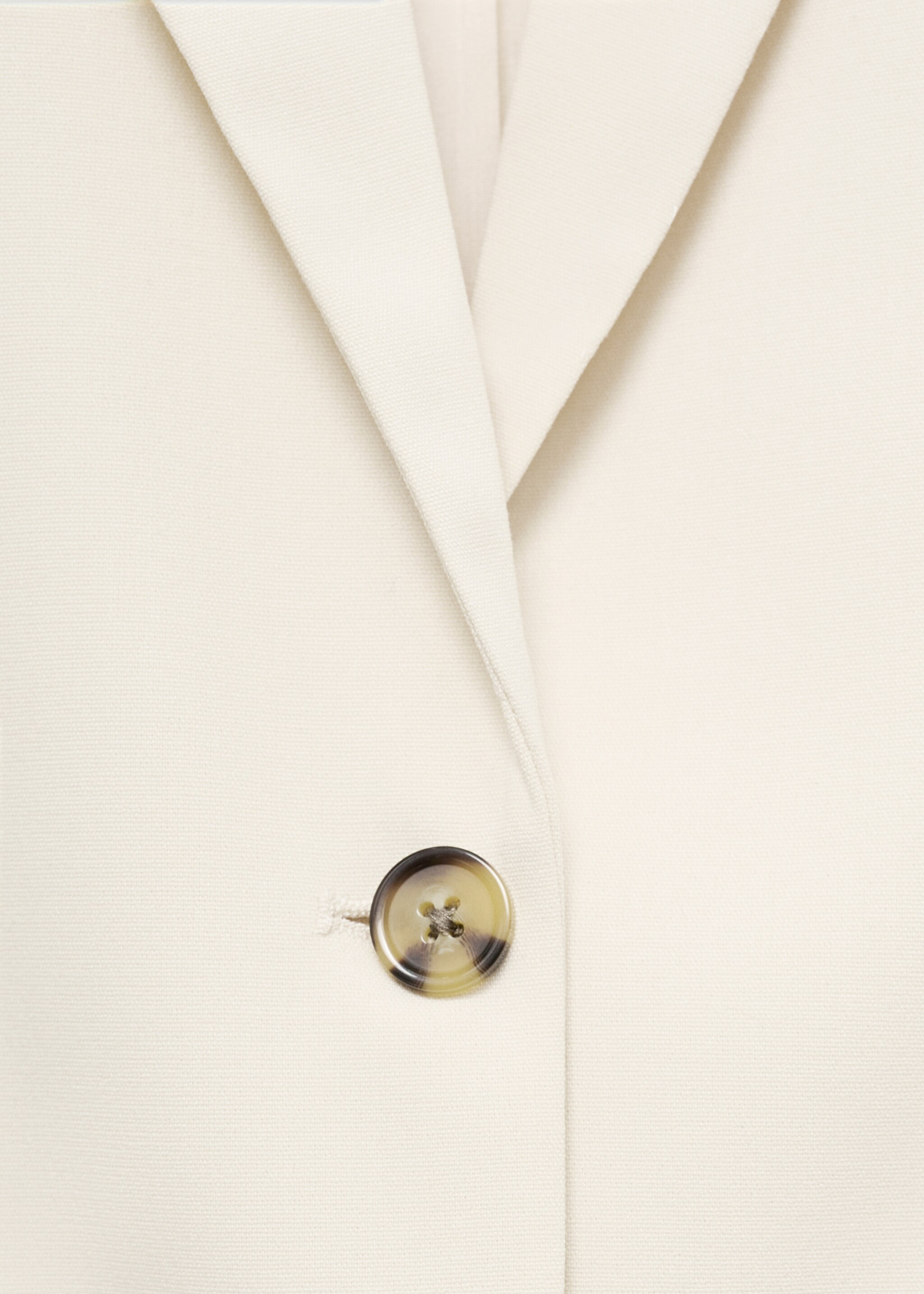Long gilet with openings - Details of the article 8, Ecru. Ref: 77072912-00.
