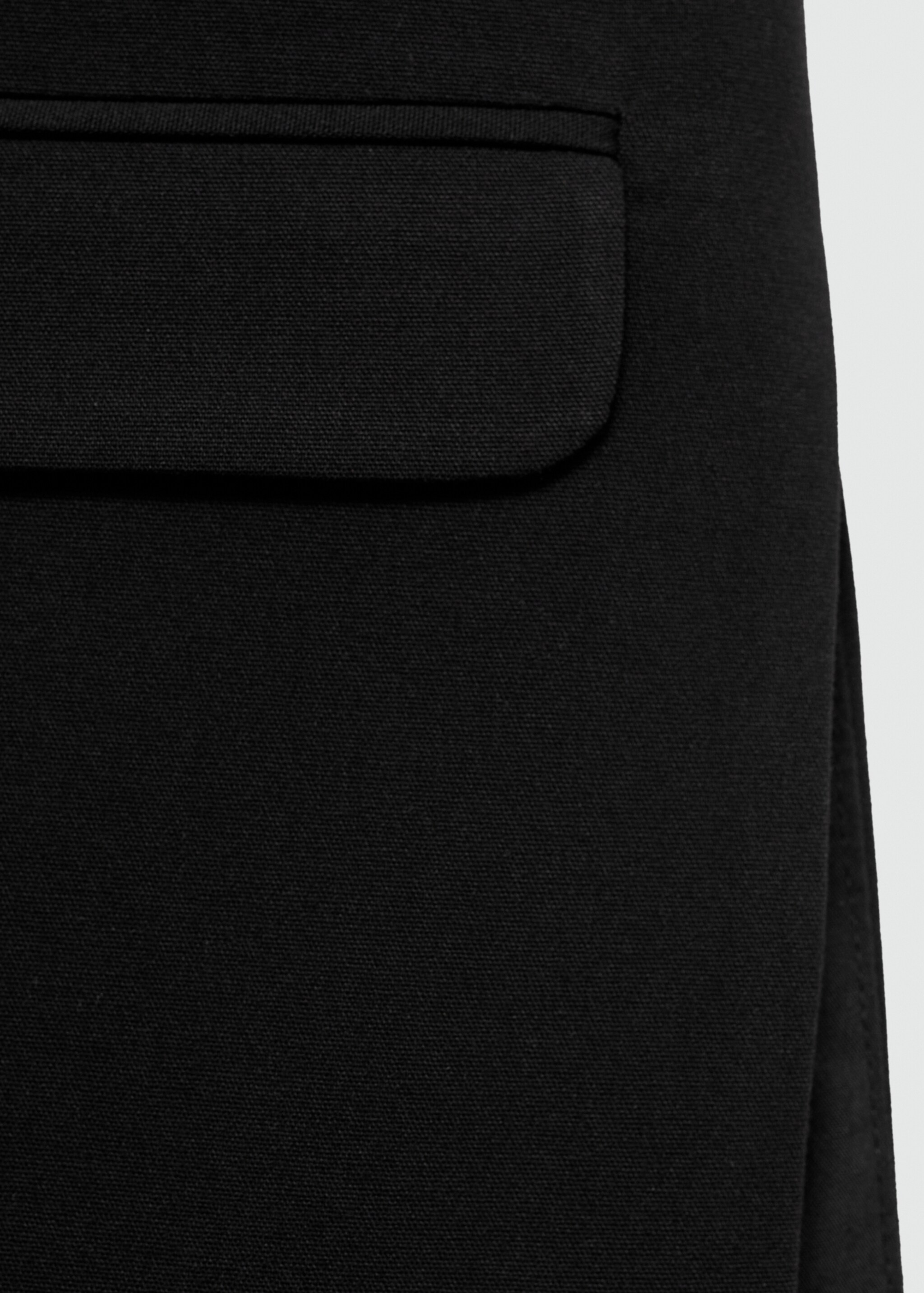 Long gilet with openings - Details of the article 0, Black. Ref: 77072912-00.