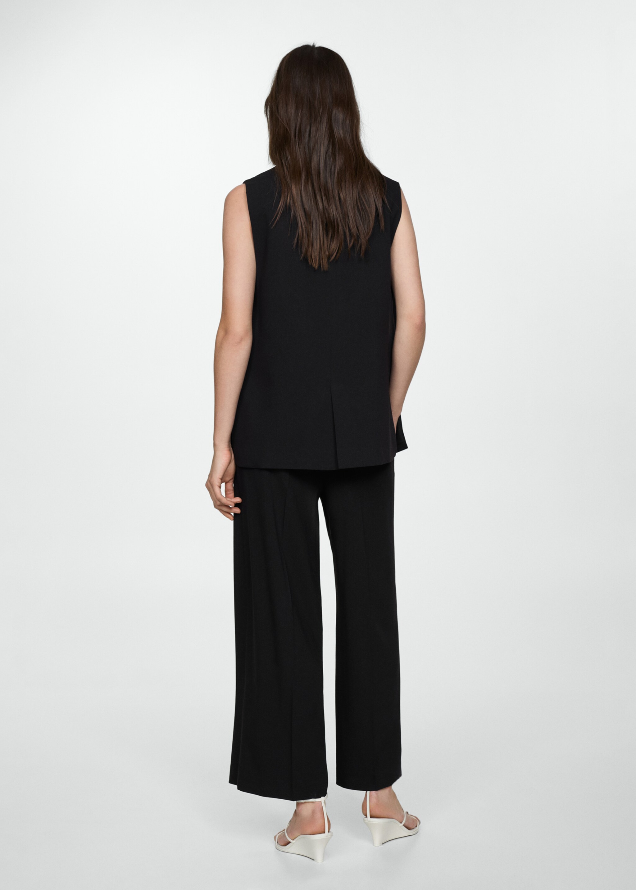 Long gilet with openings - Reverse of the article, Black. Ref: 77072912-00.