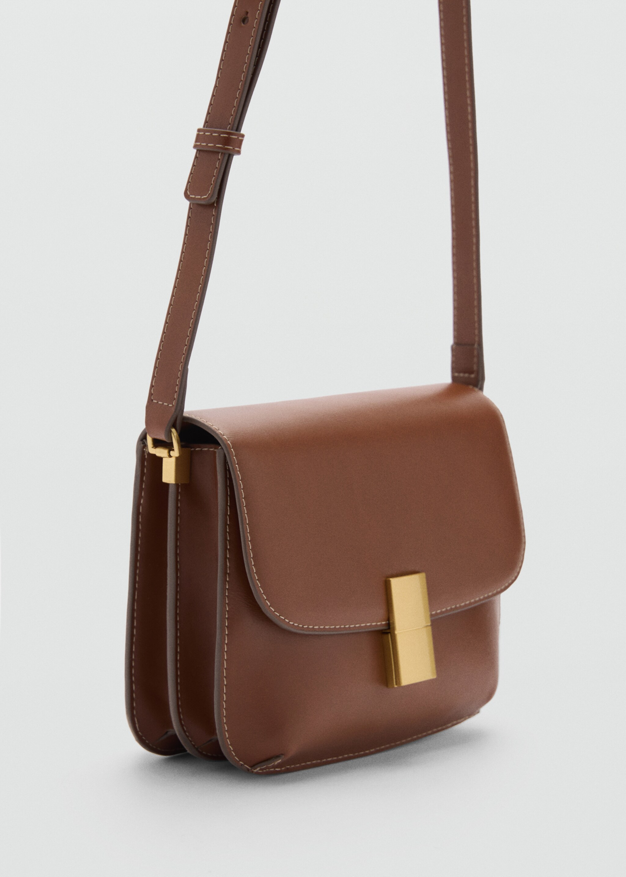 Crossbody bag with metal closure - Medium plane, Leather. Ref: 77074011-00.