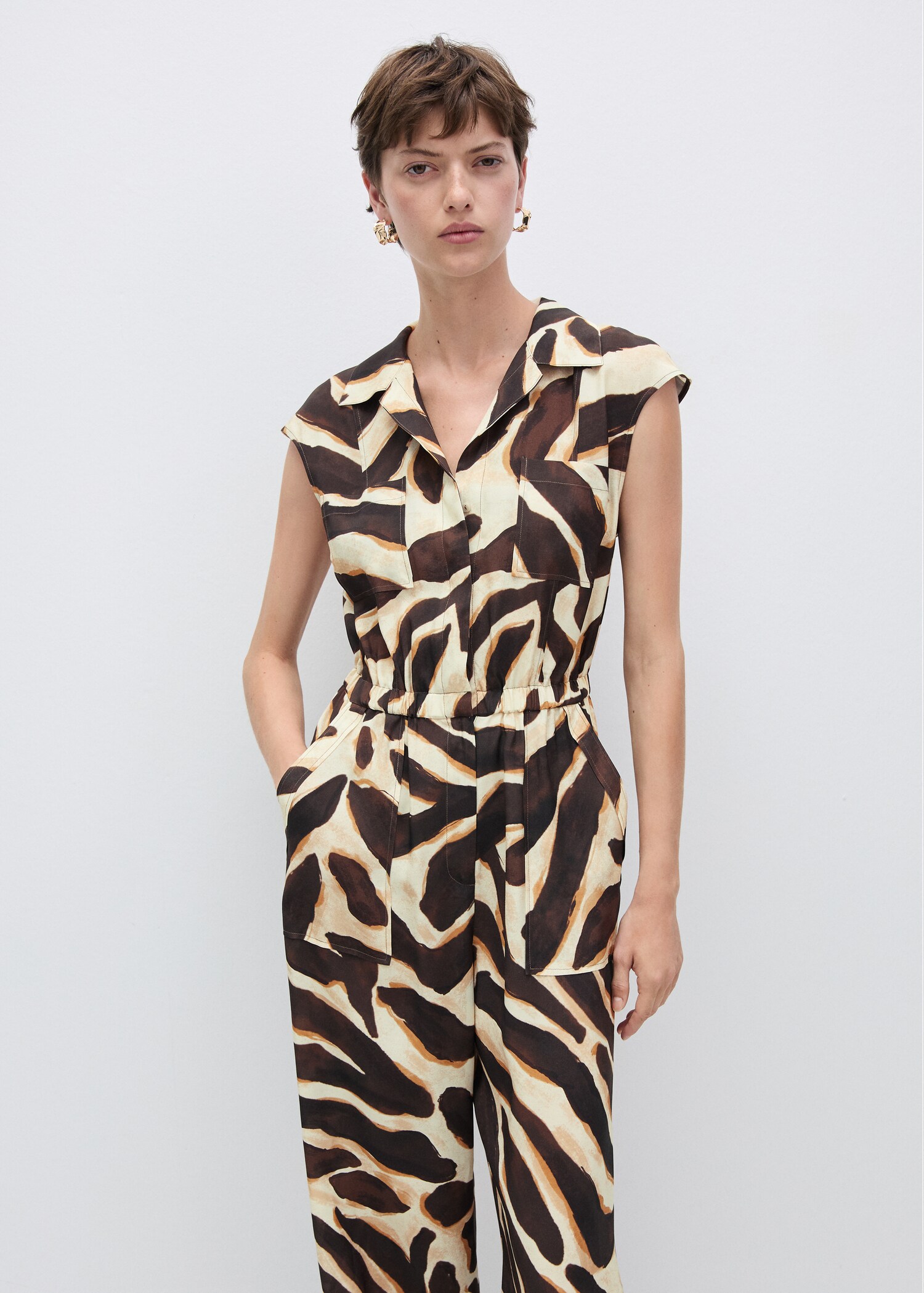 Jumpsuit fickor animal print - Bild av mittparti