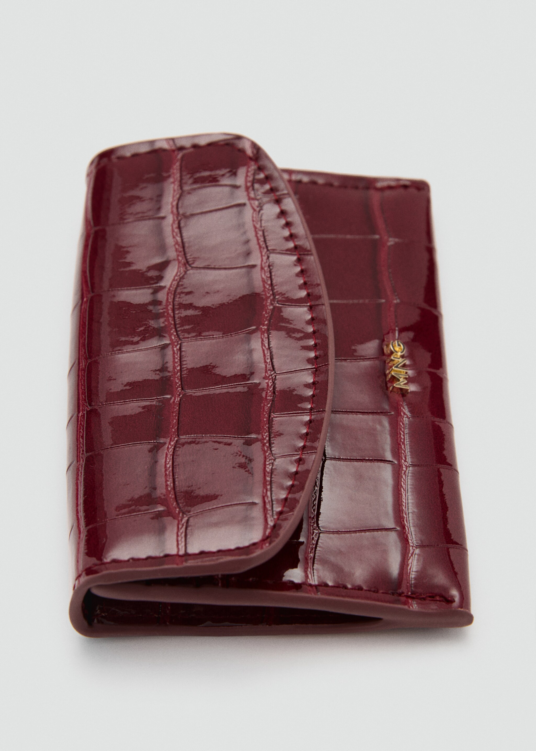 Geldbörse mit Kroko-Effekt - Detail des Artikels 1, Bordeaux. Ref: 77074043-00.