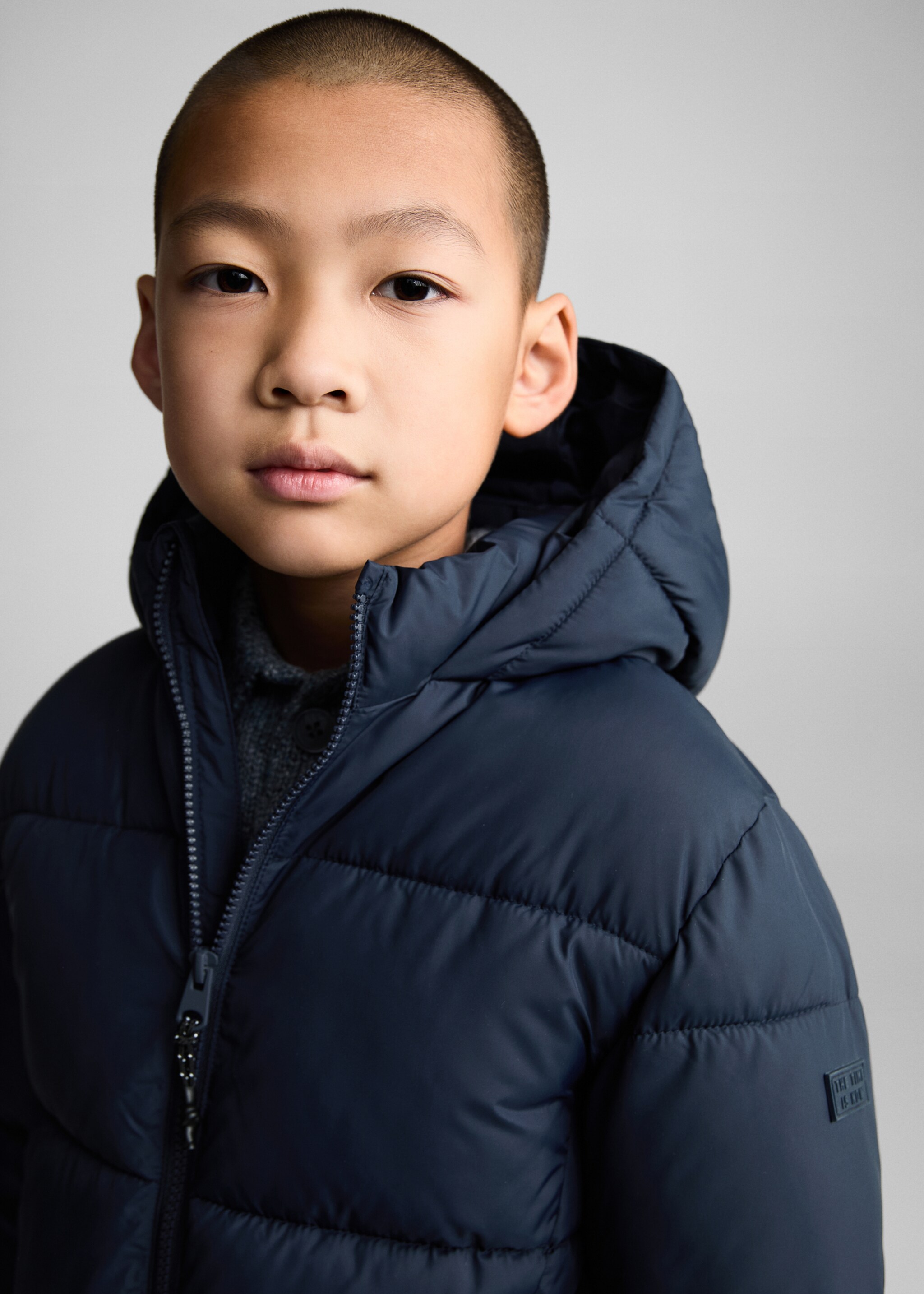 Quilted long coat - Details of the article 1, Dark Navy. Ref: 77075146-00.