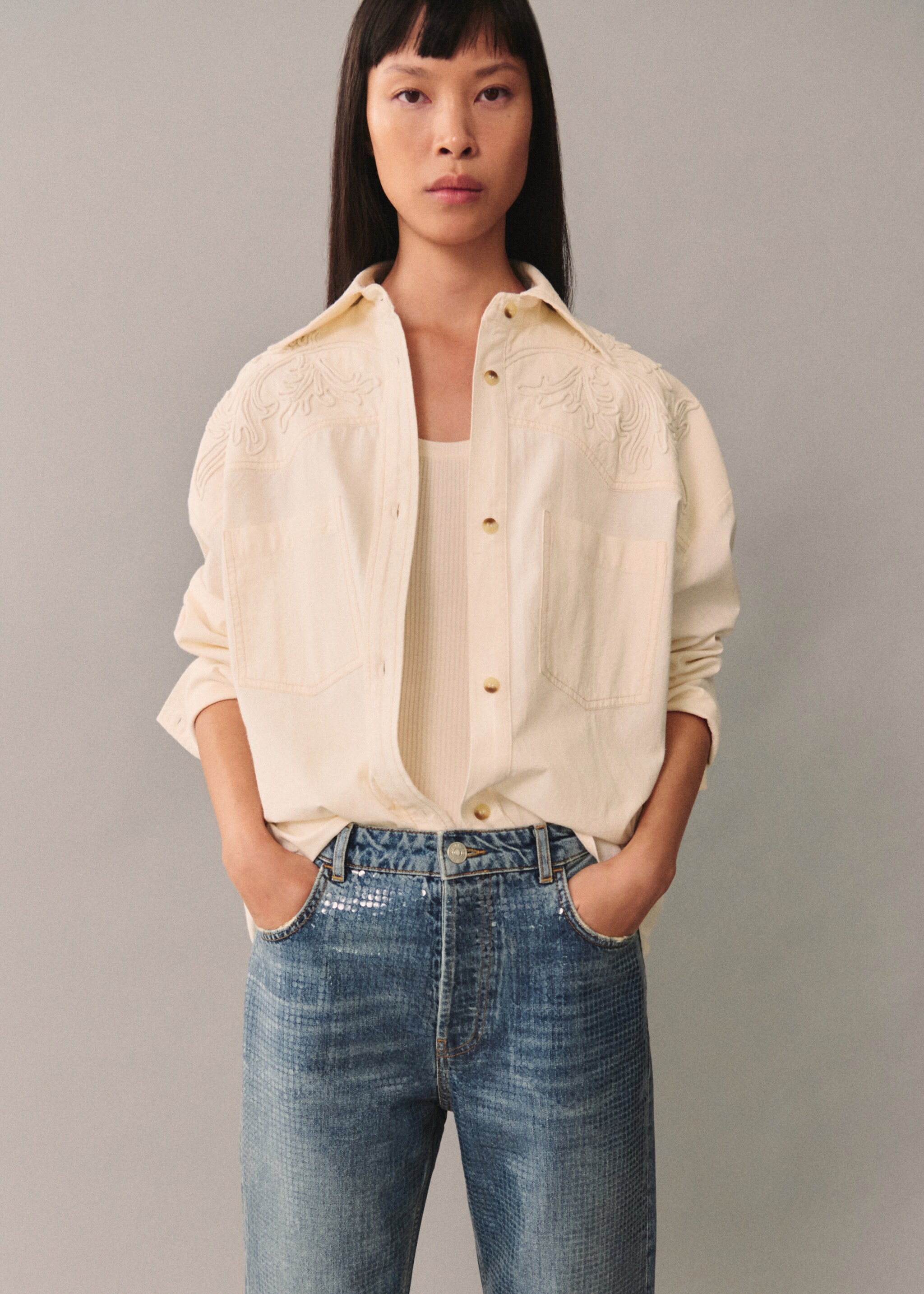 Jeans with sequins under slits - Details of the article 1, Medium Blue. Ref: 77075670-00.