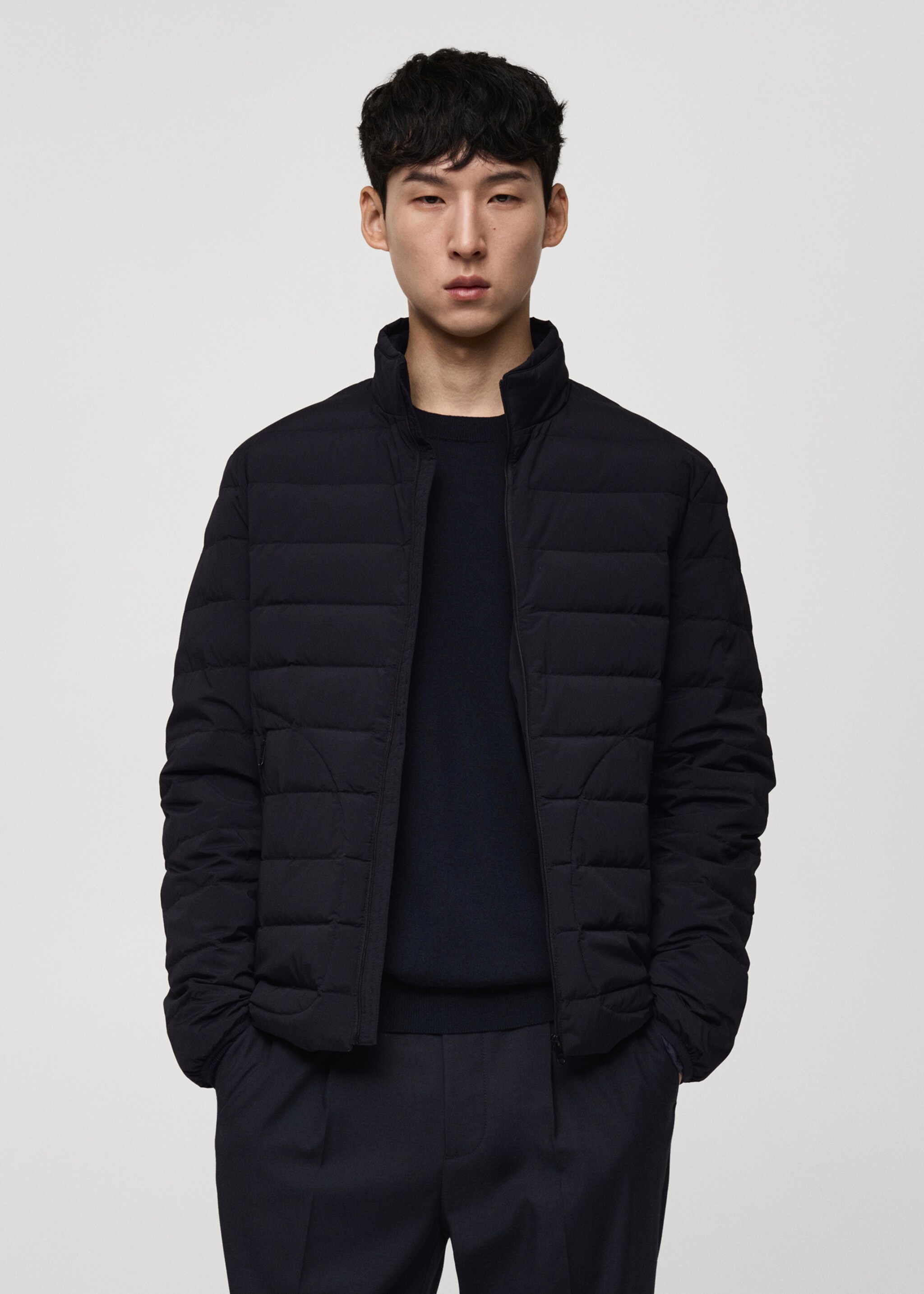 Jaqueta embuatada farcit plomes - Pla mig, Blau marí fosc. Ref: 77075959-00.