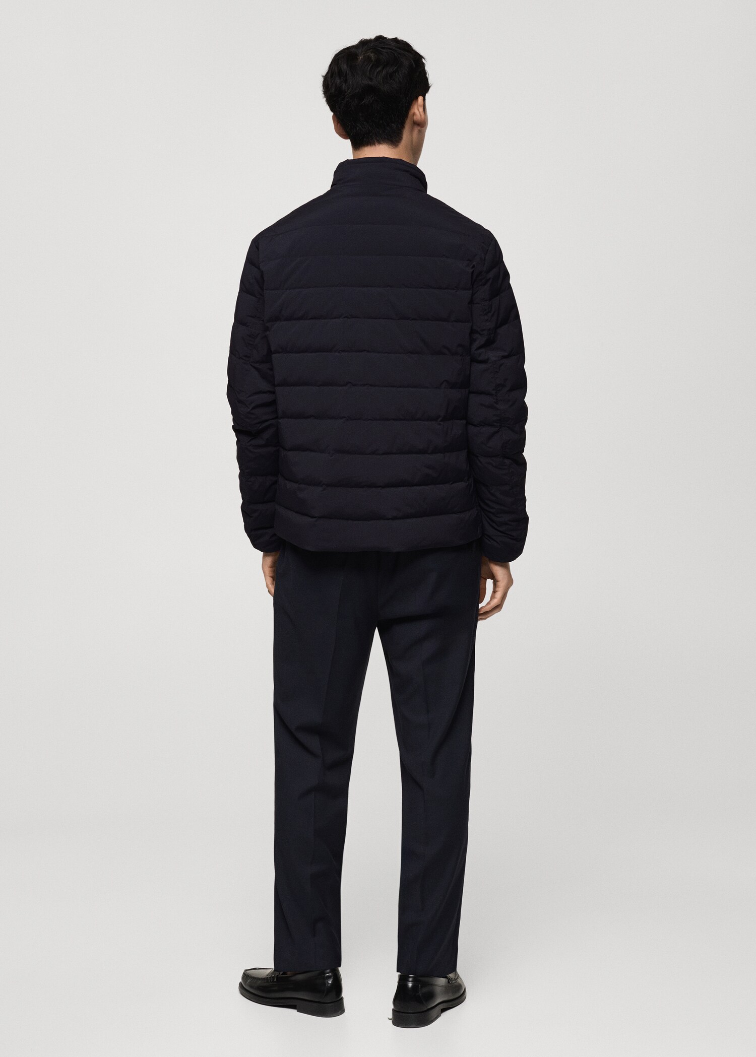 Quilted jacket with feather filling - Reverse of the article