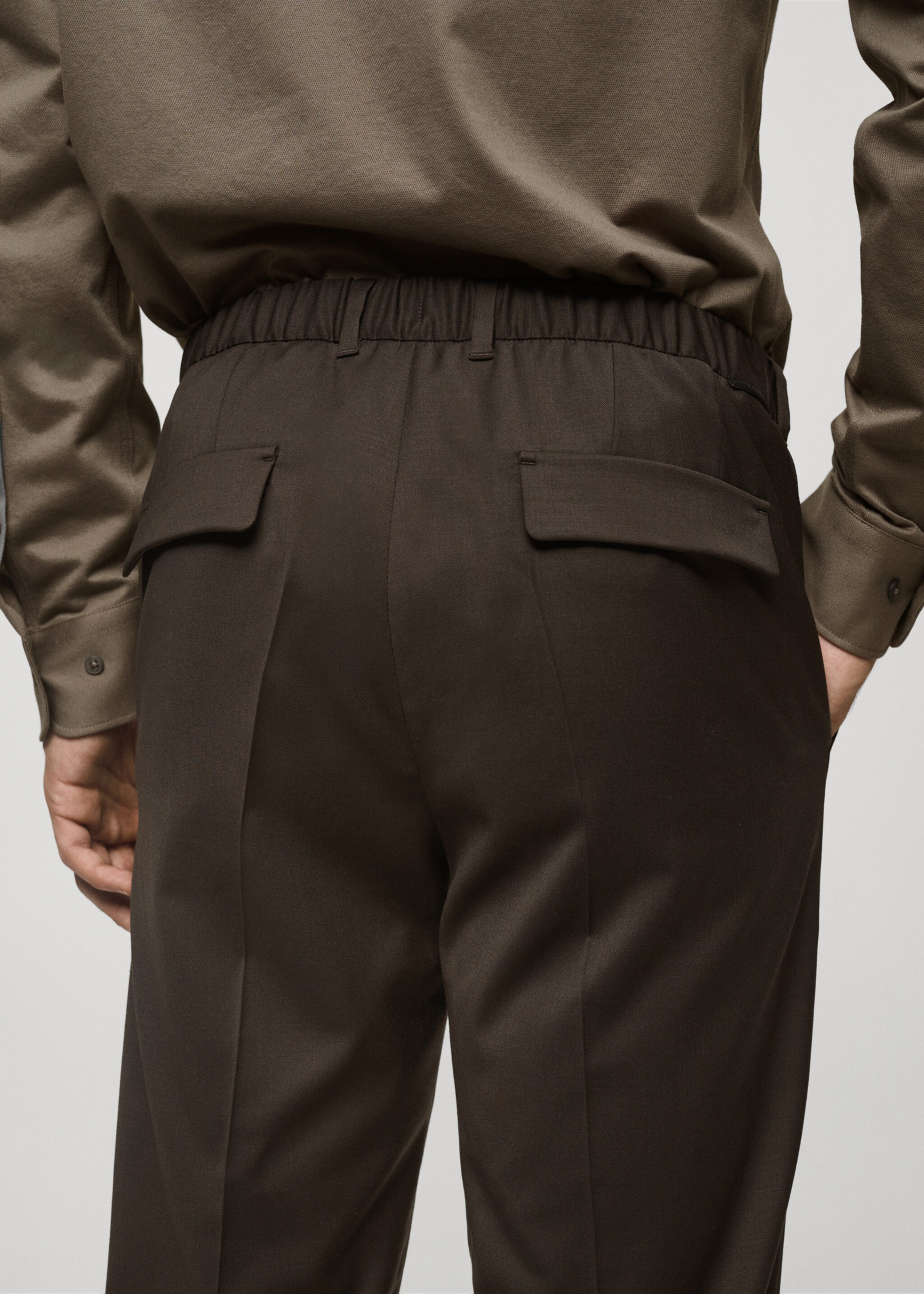Coolmax® stretch-fabric slim-fit trousers - Details of the article 6, Brown. Ref: 77075963-00.