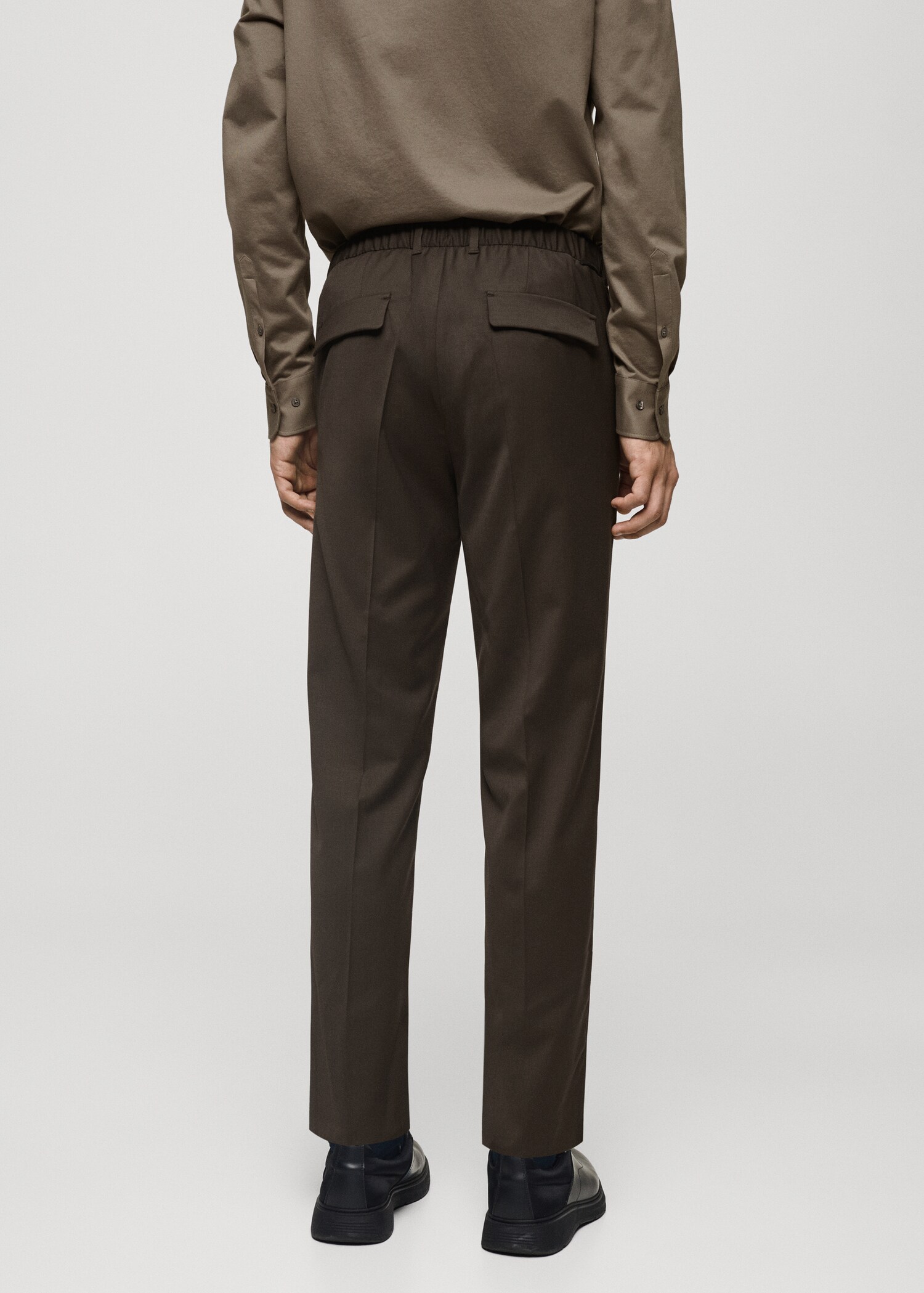 Coolmax® stretch-fabric slim-fit pants - Reverse of the article