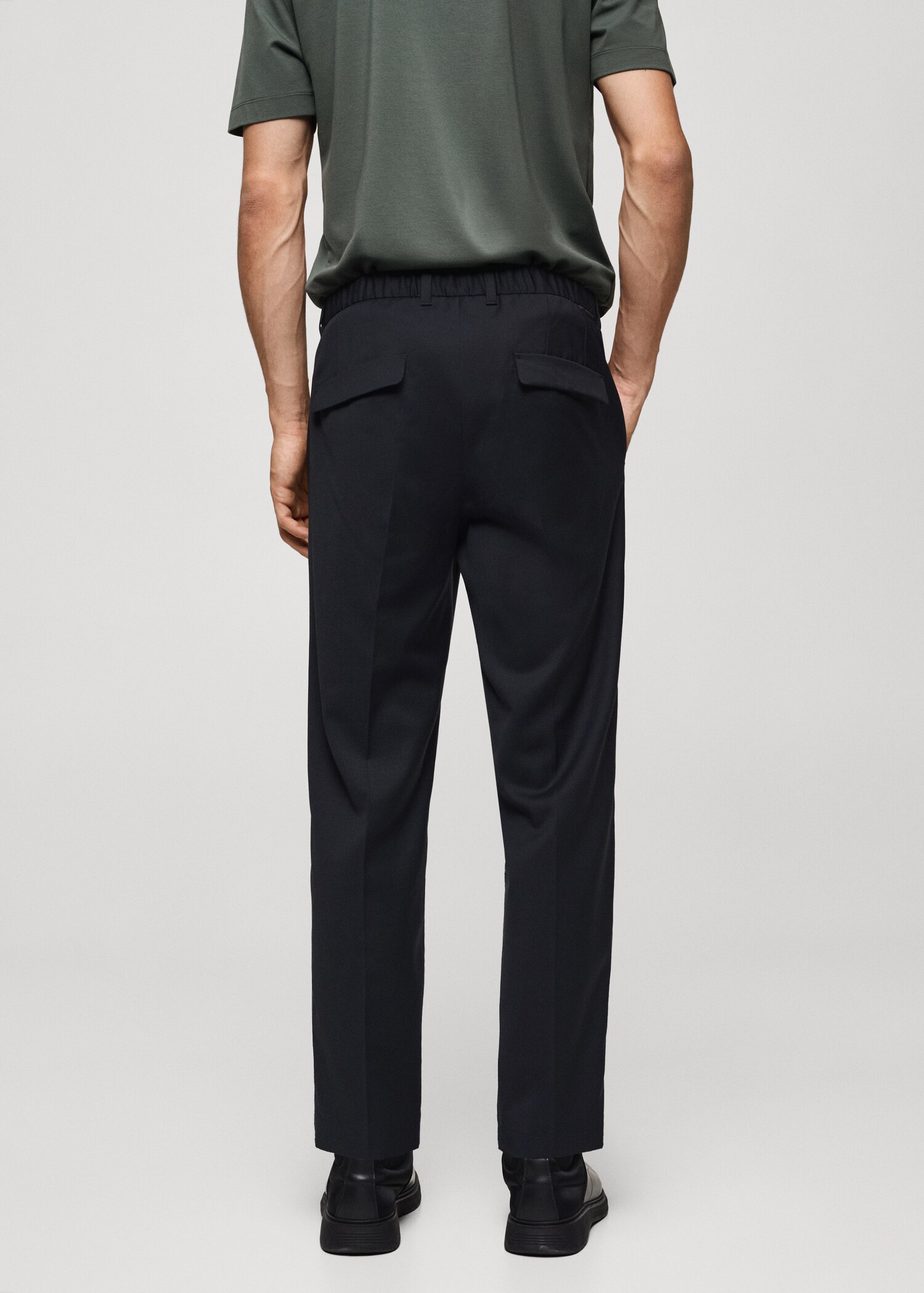 Coolmax® stretch-fabric slim-fit pants - Reverse of the article