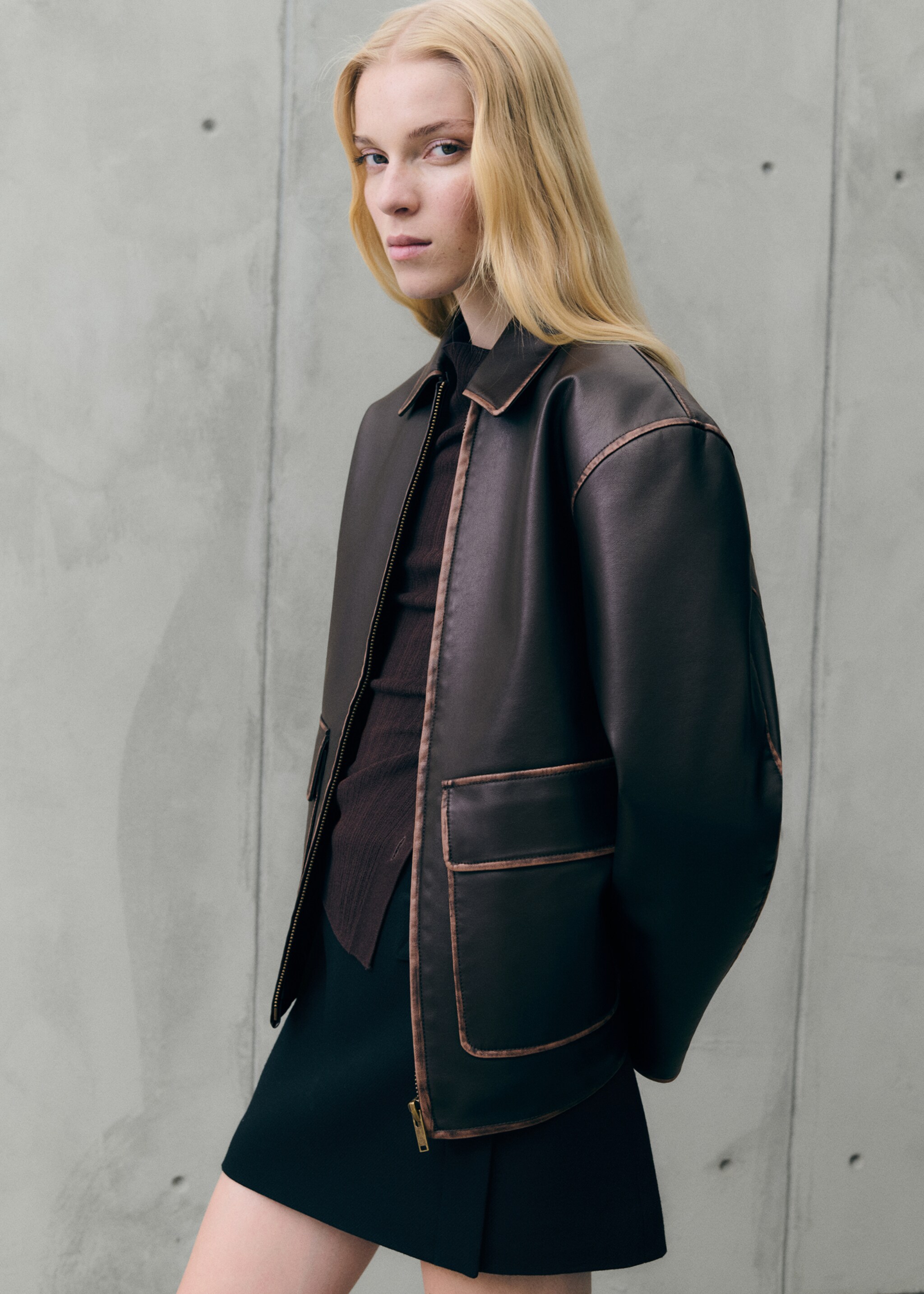 Leather-effect jacket with contrast stitching - Details of the article 6, Brown. Ref: 77076004-00.
