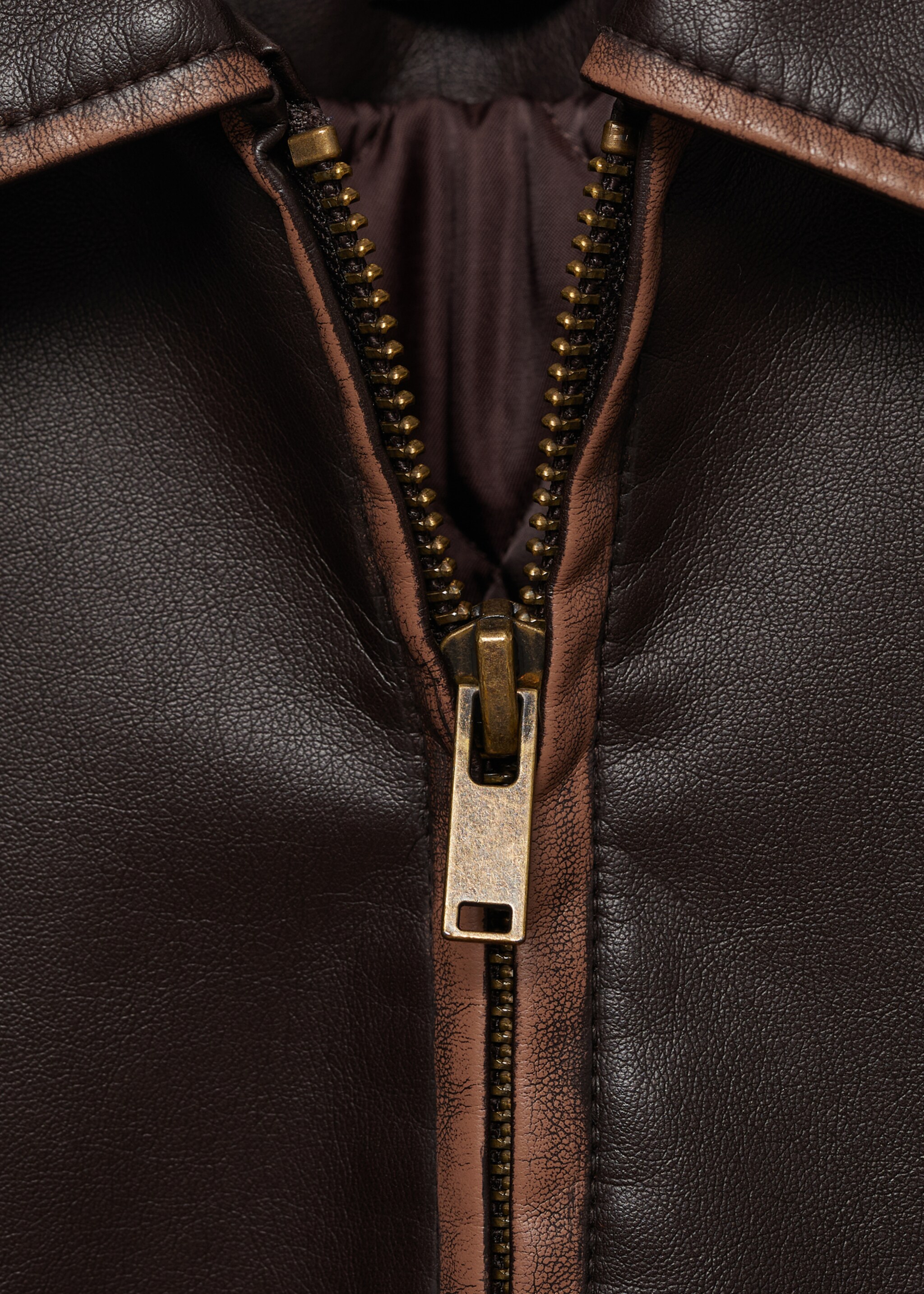 Leather-effect jacket with contrast stitching - Details of the article 8, Brown. Ref: 77076004-00.