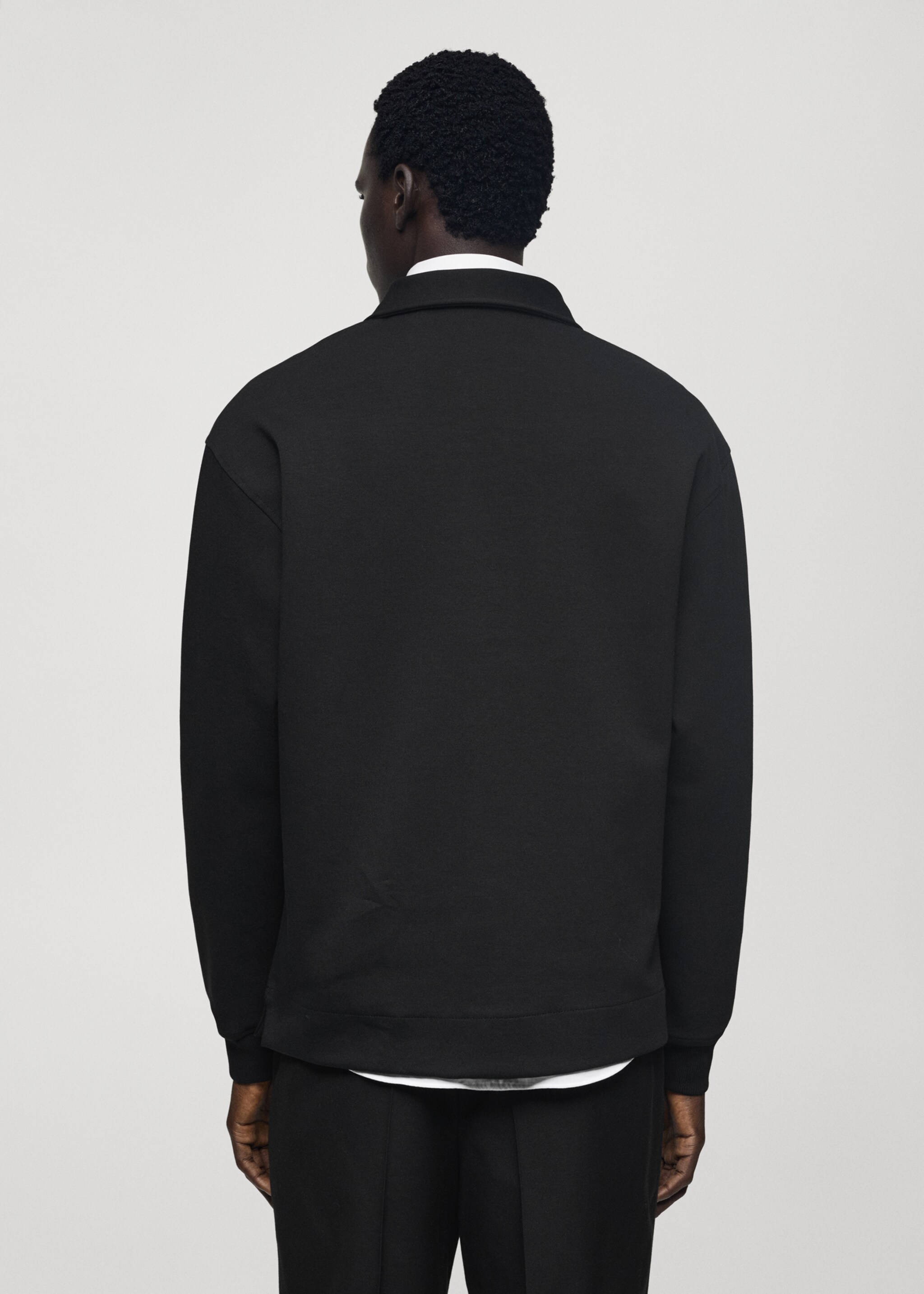 Polo algodón relaxed fit - Reverso del artículo, Negro. Ref: 77077111-00.