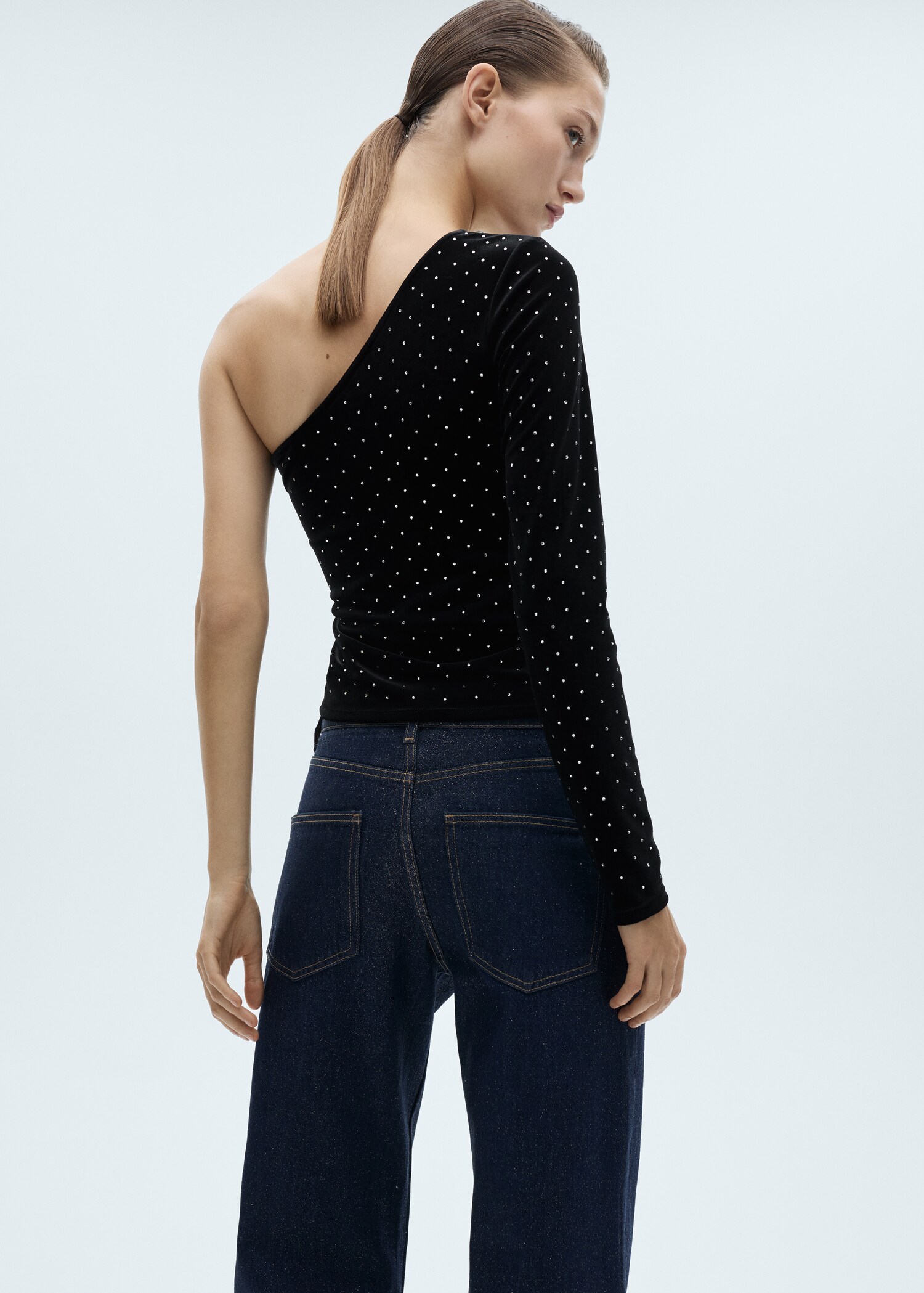 Asymmetrical velvet top with rhinestones - Reverse of the article