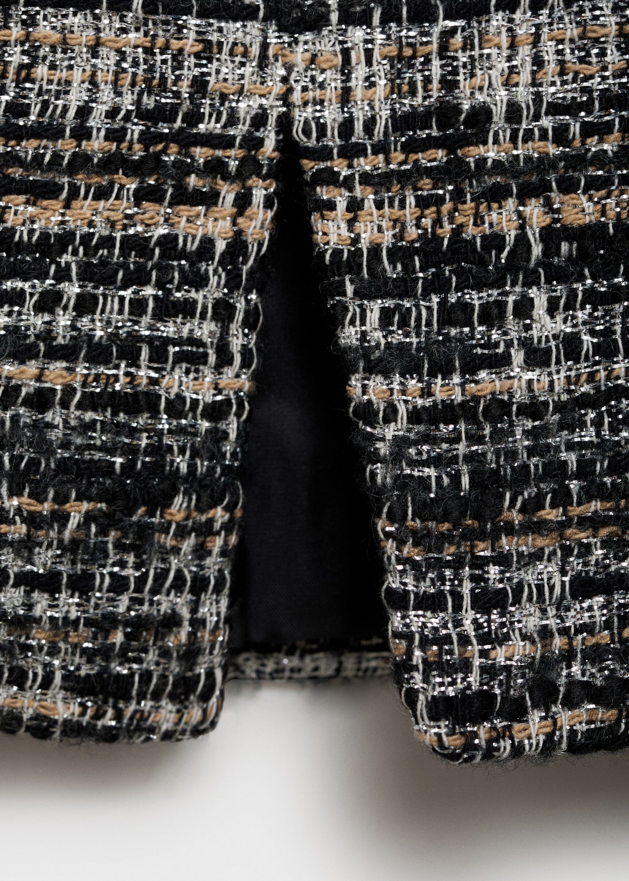 Tweed mini-skirt with bows - Details of the article 0, Black. Ref: 77079245-00.