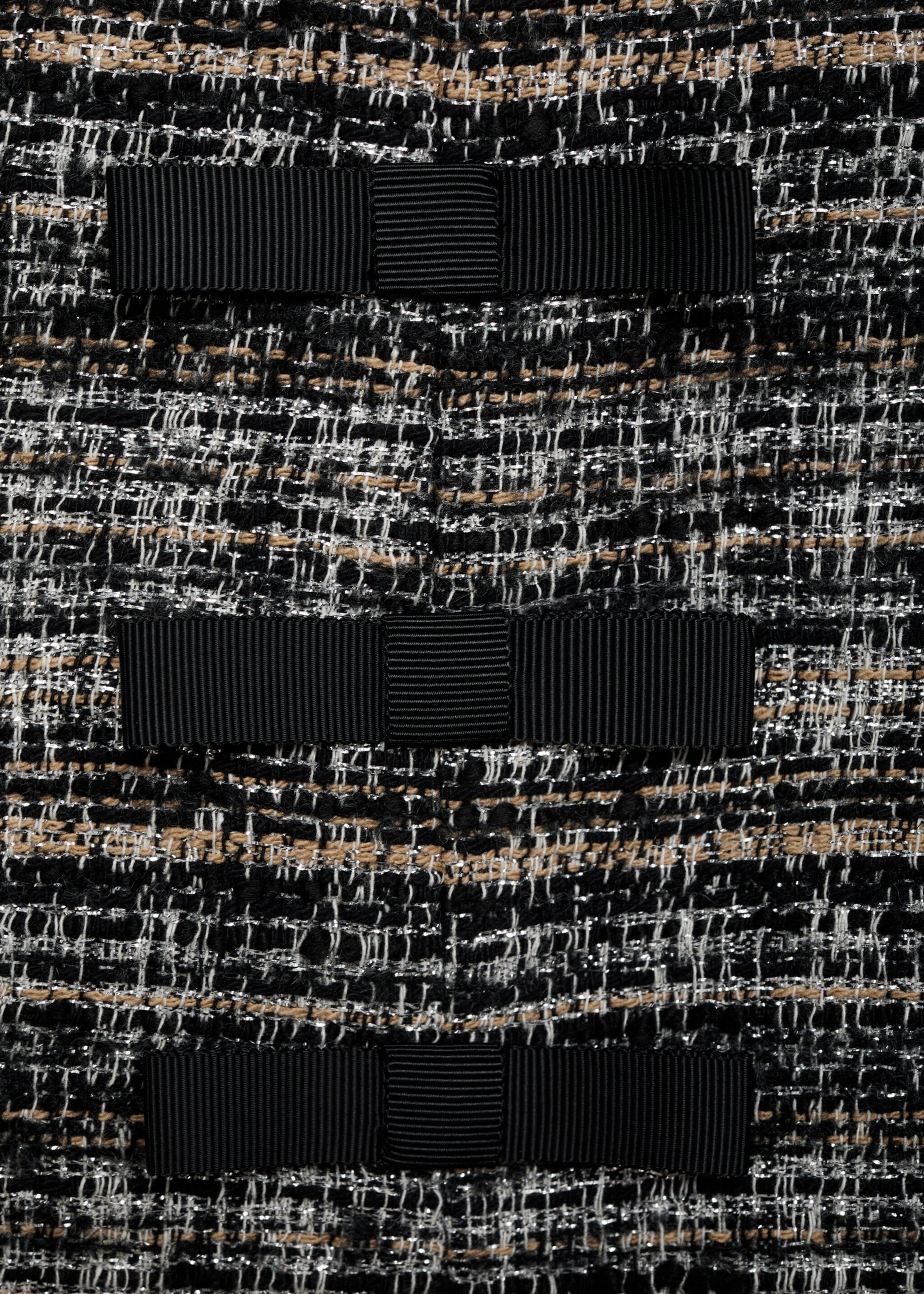 Tweed mini-skirt with bows - Details of the article 8, Black. Ref: 77079245-00.