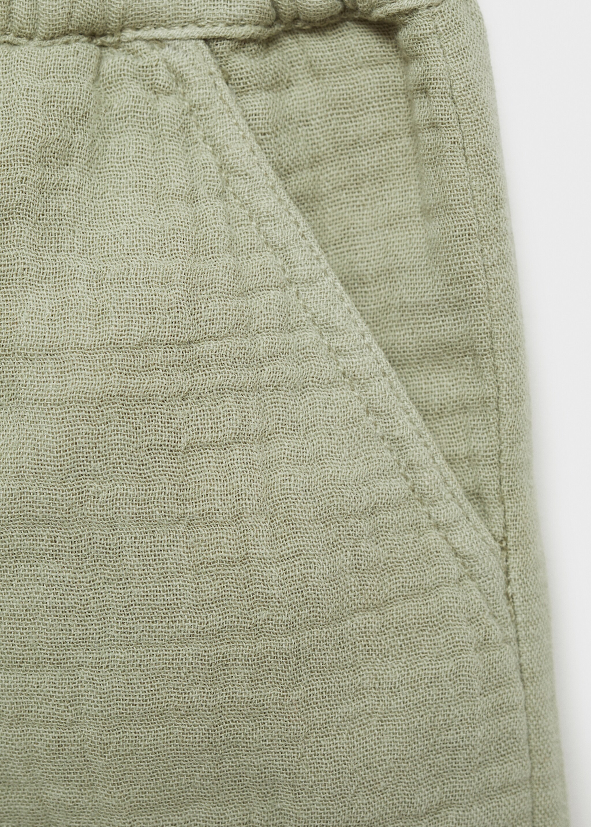 Short coton poches - Détail de l'article 8, Vert. Ref: 77080384-00.