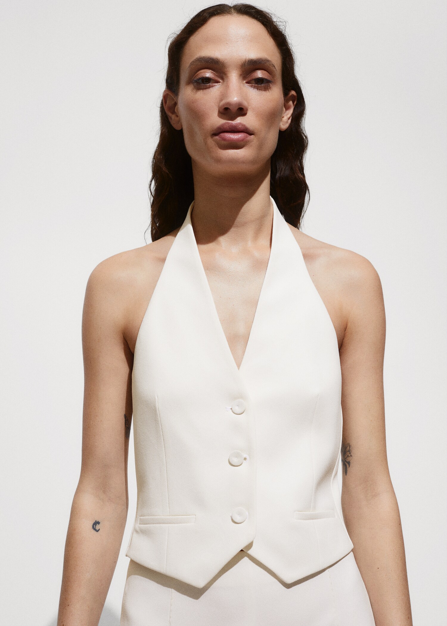 Armilla coll halter botons - Pla mig