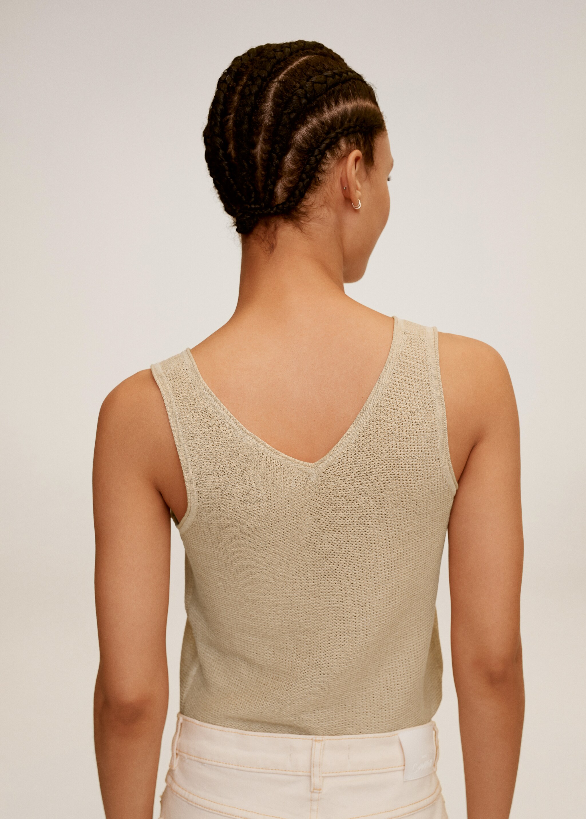 Top cuello pico - Reverso del artículo