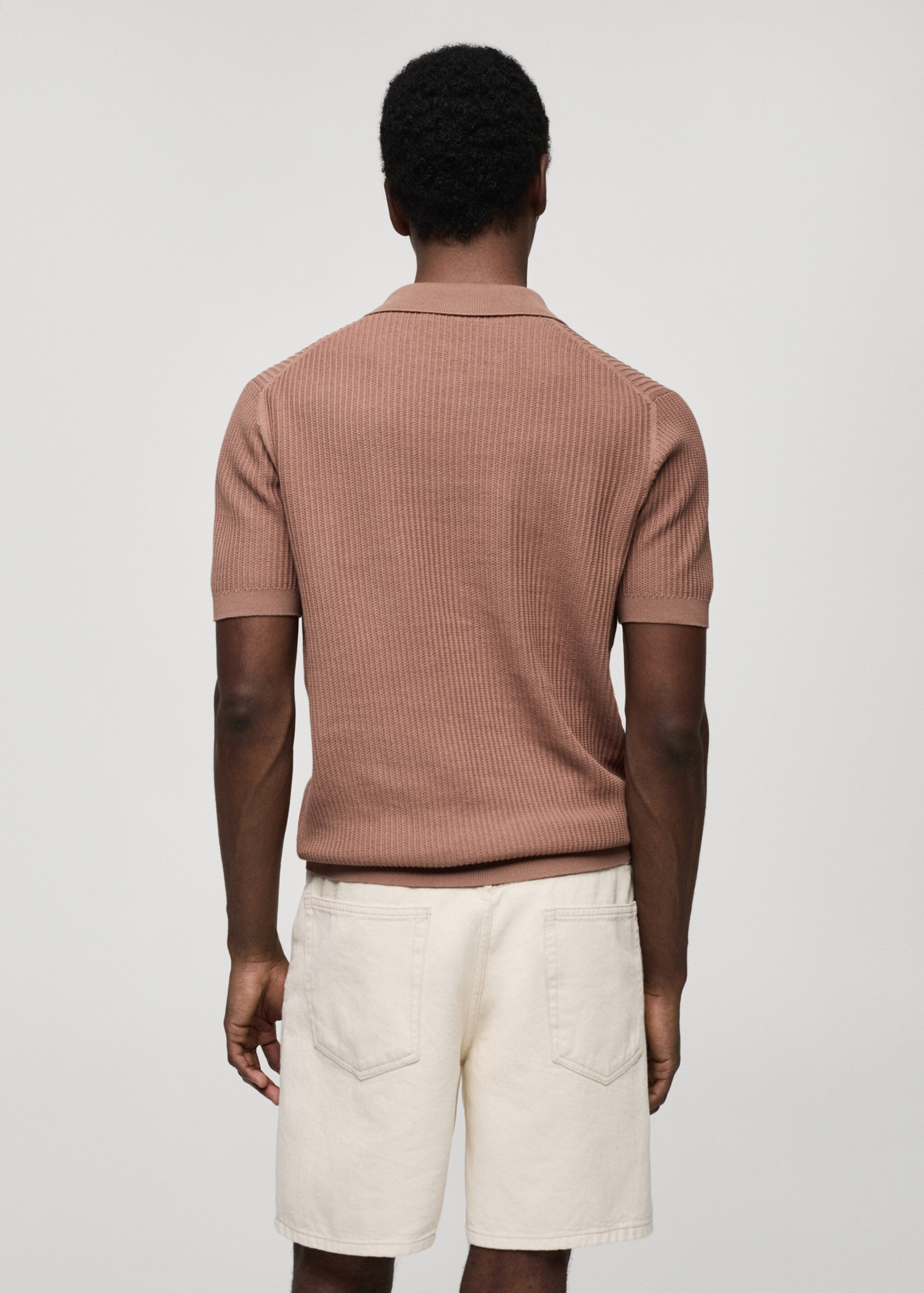 Geripptes Strick-Poloshirt aus Baumwolle - Rückseite des Artikels