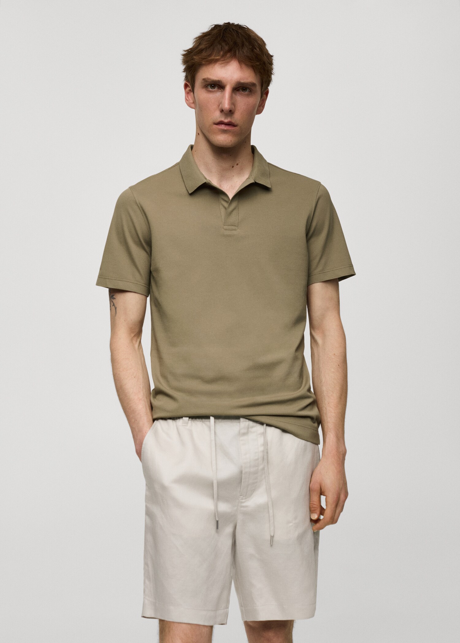 Slim Fit-Poloshirt aus Baumwoll-Piqué - Mittlere Ansicht