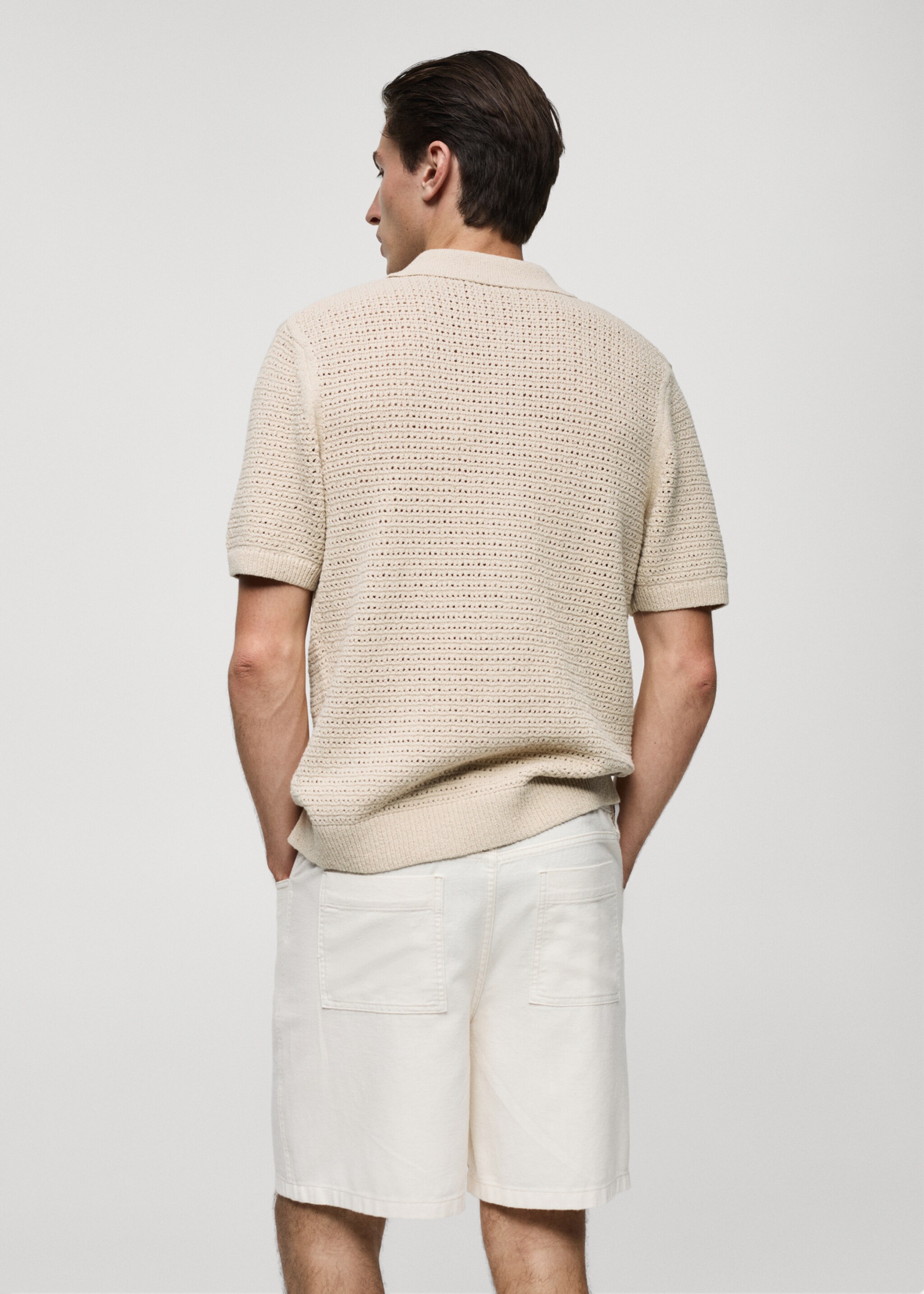 Openwork knit polo with buttons - Reverse of the article