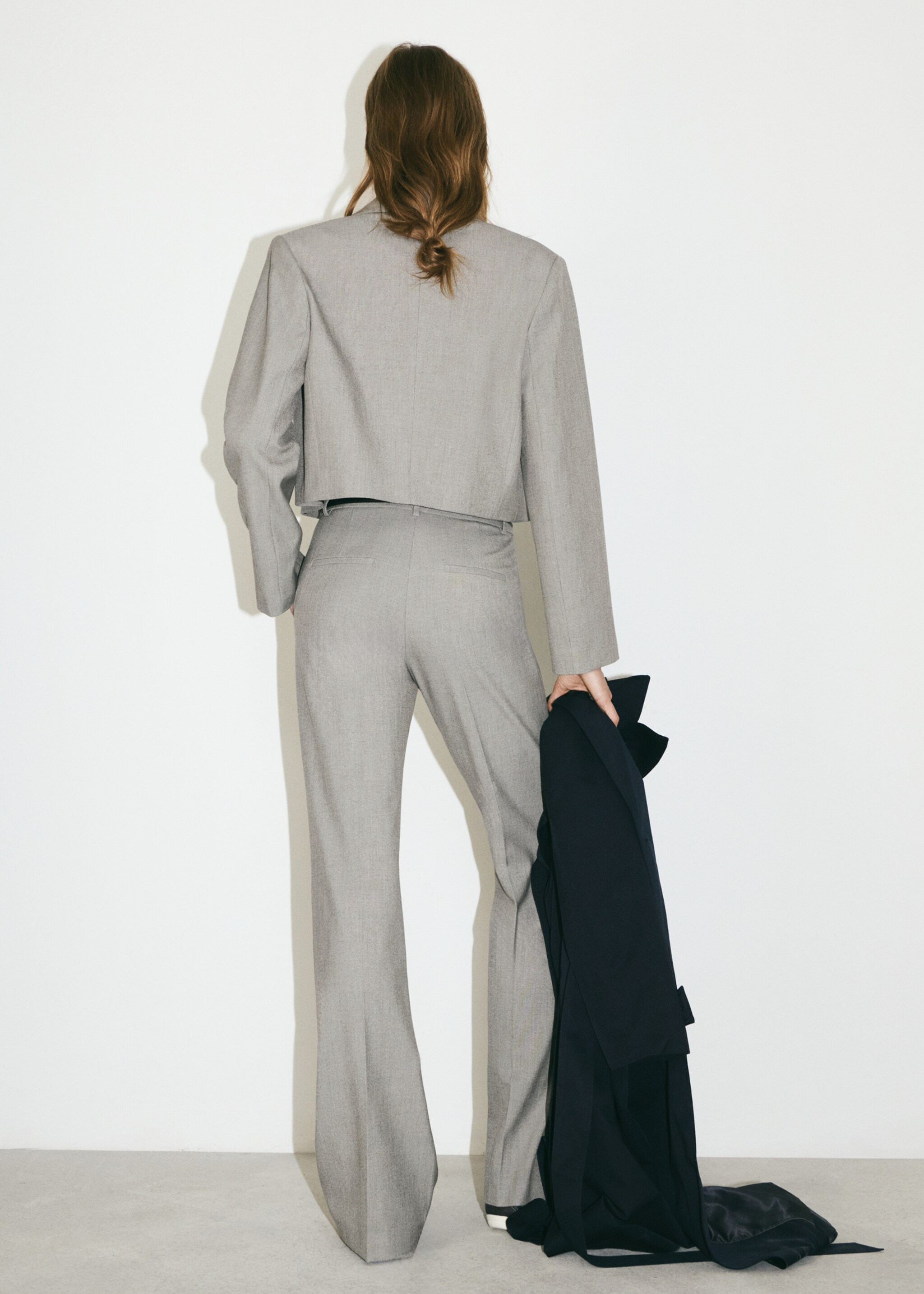 High-waist flared trousers - Details of the article 9, Light Heather Grey. Ref: 77084763-00.