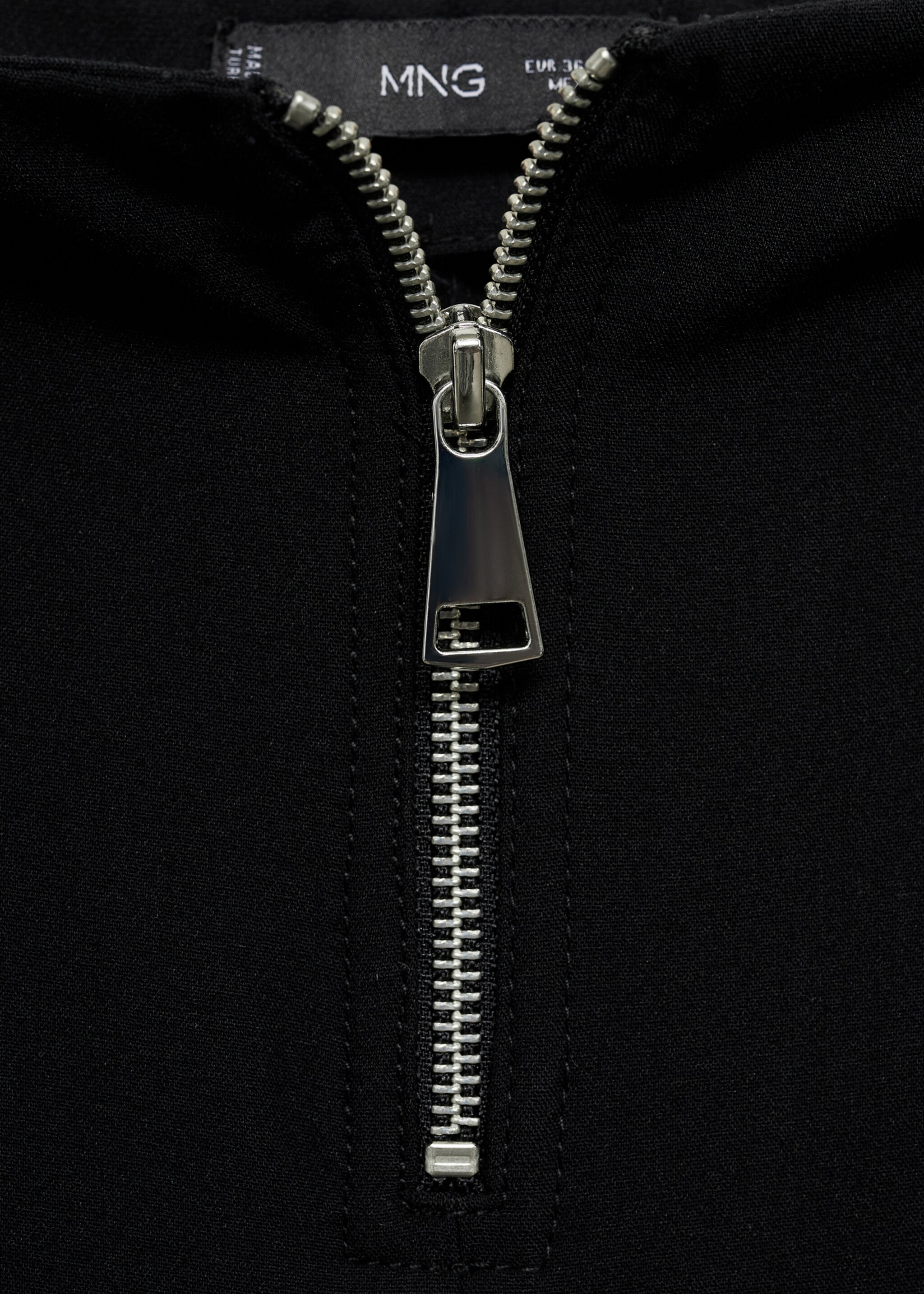 Flared trousers with zip - Details of the article 8, Black. Ref: 77085657-00.