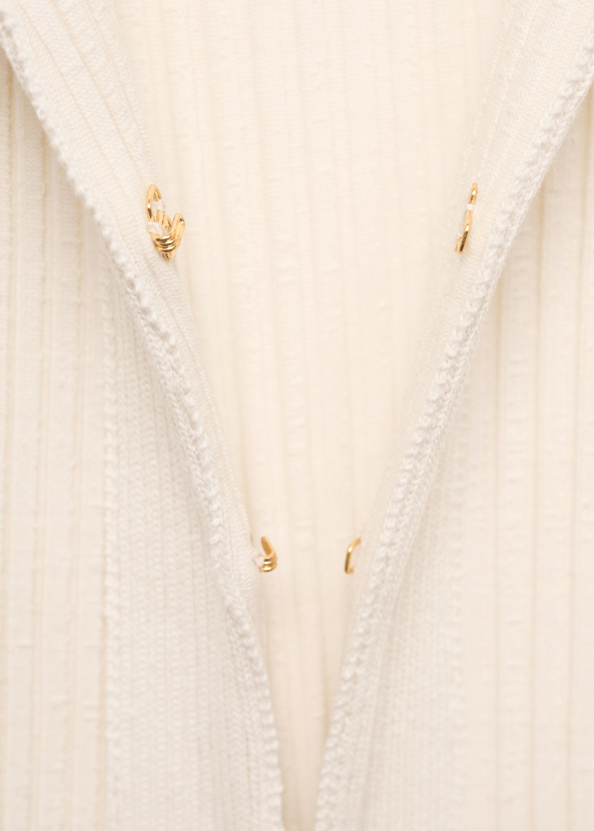 Ribbed cardigan with hooks - Details of the article 8, Ecru. Ref: 77085669-00.