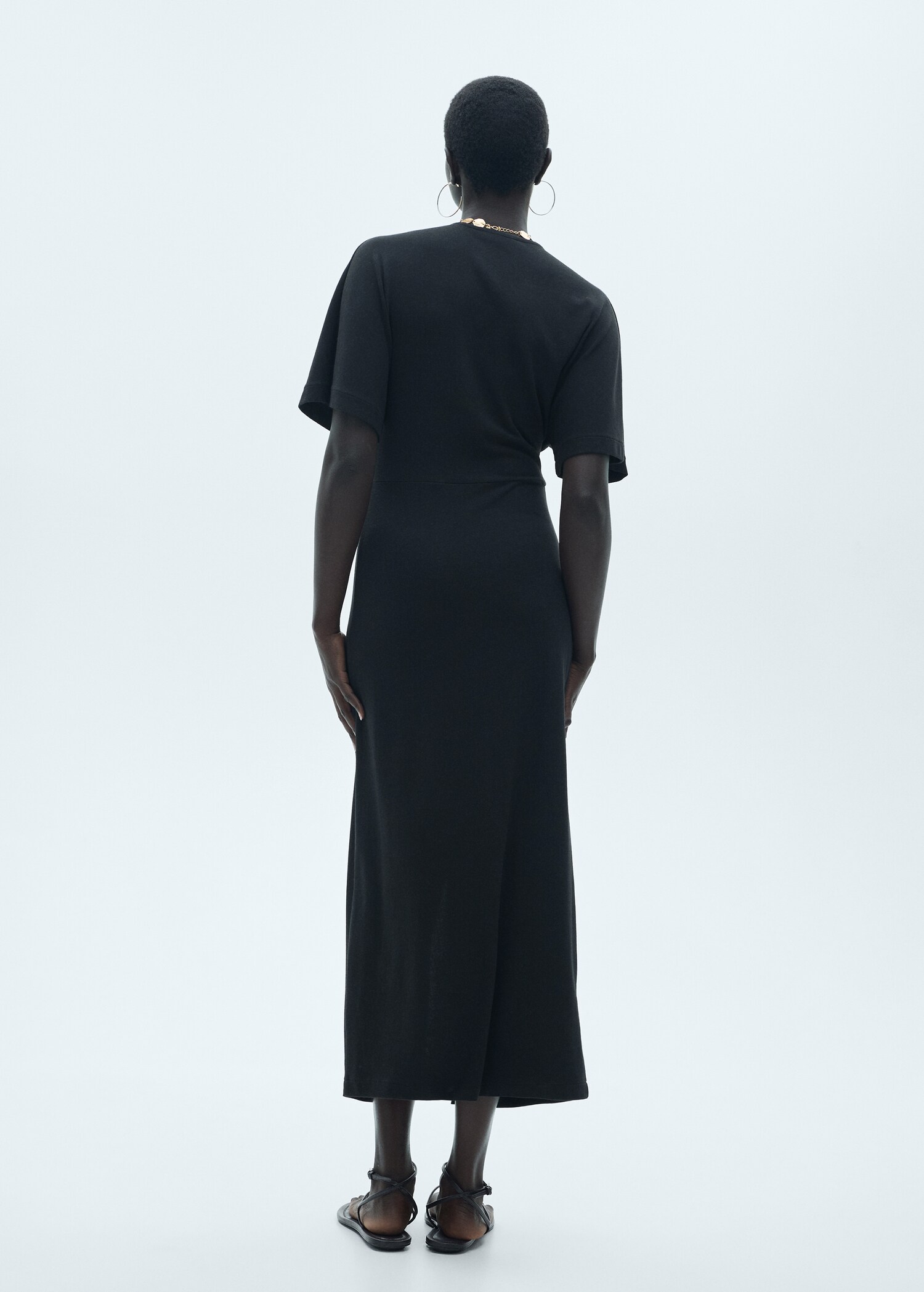 Short-sleeved draped dress - Reverse of the article