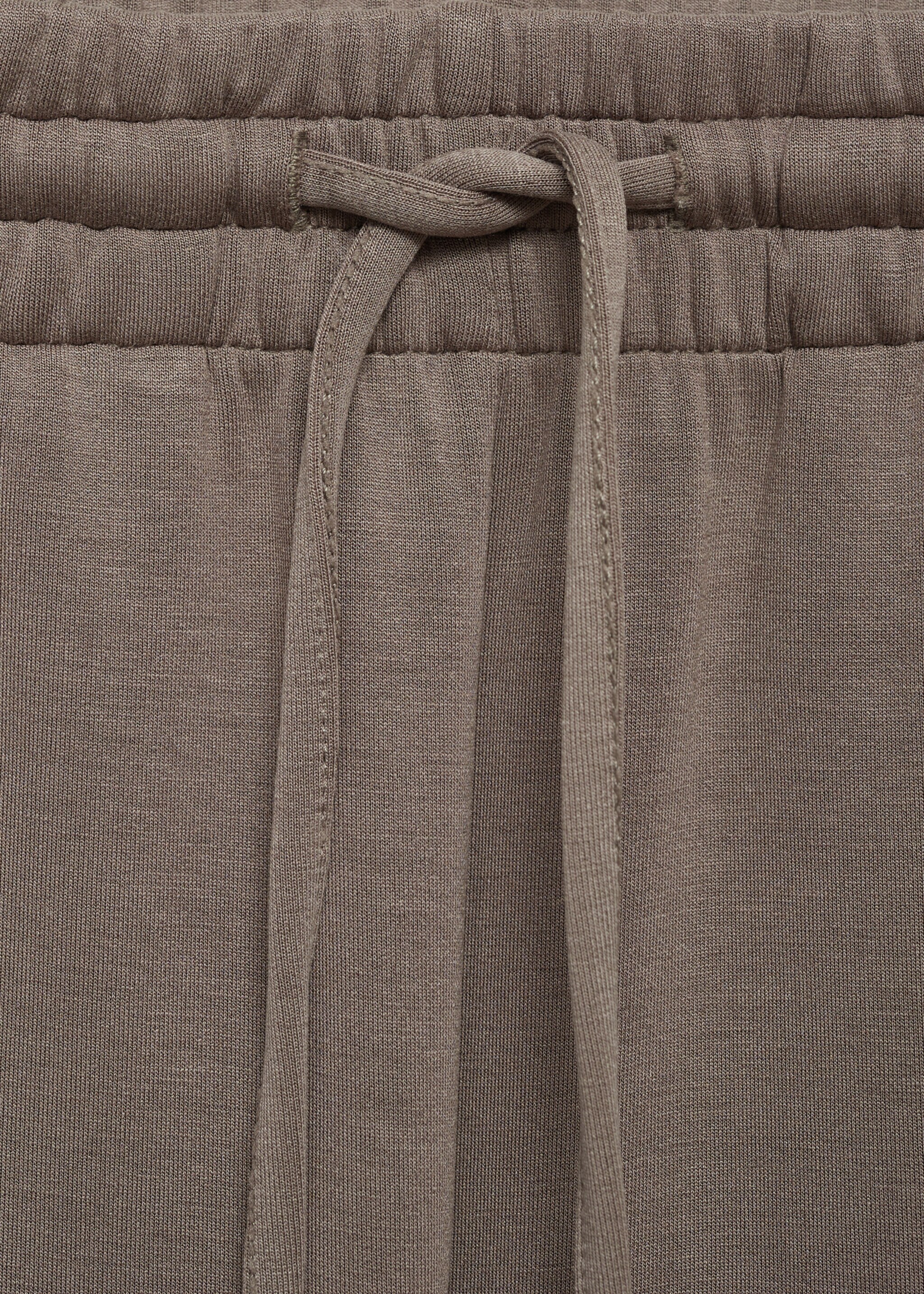 Jogger trousers with elastic waist - Details of the article 8, Medium Brown. Ref: 77087691-00.
