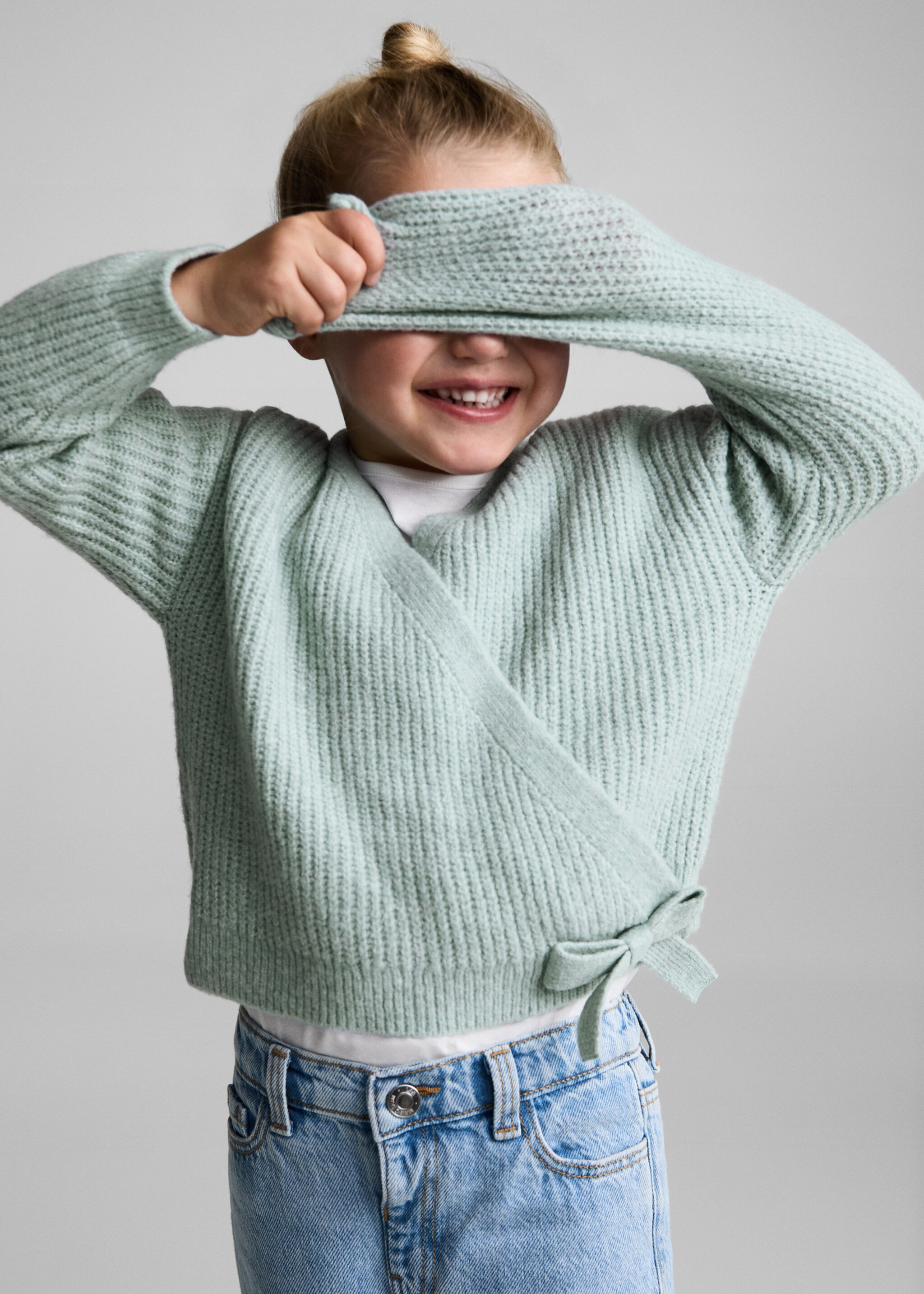 Gekruist vest met strik - Detail van het artikel 4, Pastelgroen. Ref: 77087712-00.
