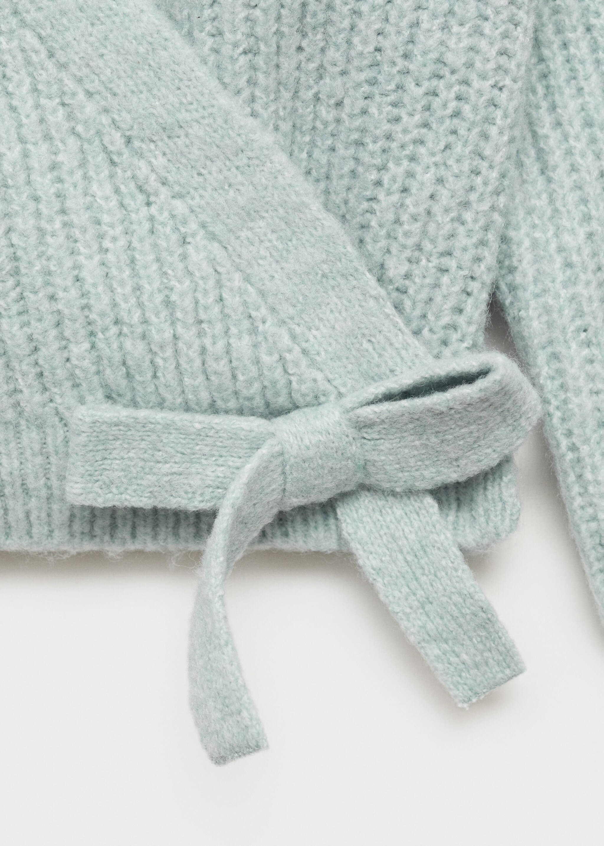 Gekruist vest met strik - Detail van het artikel 8, Pastelgroen. Ref: 77087712-00.