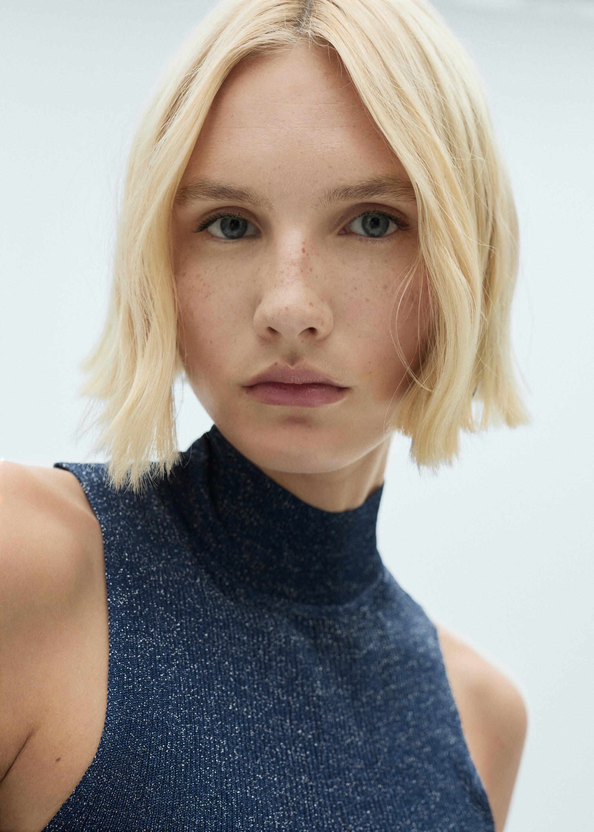 Lurex knitted top with perkins neck - Details of the article 1, Night Blue. Ref: 77089055-00.