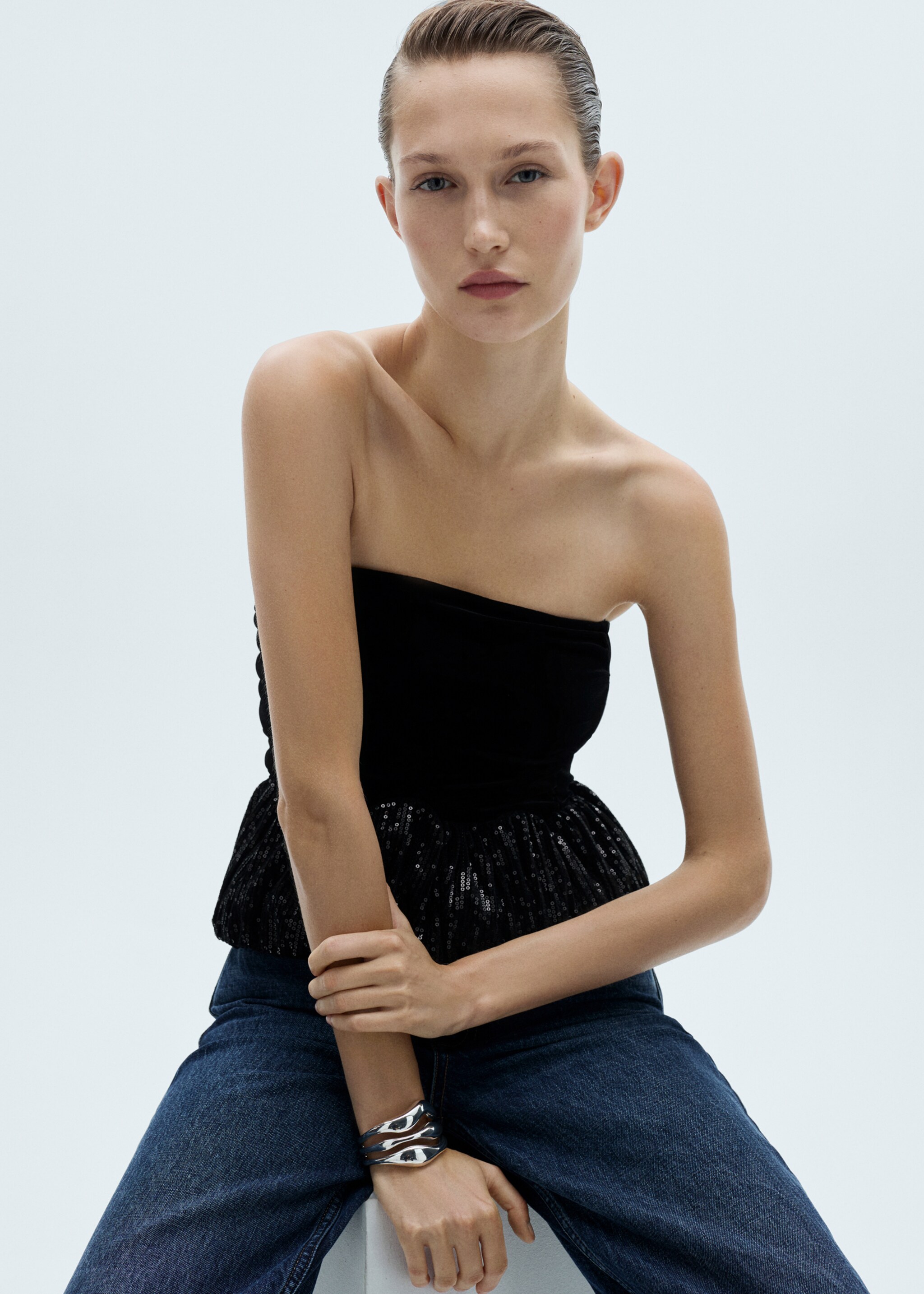 Peplum-Top mit Paillettenbesatz - Mittlere Ansicht, Schwarz. Ref: 77089057-00.