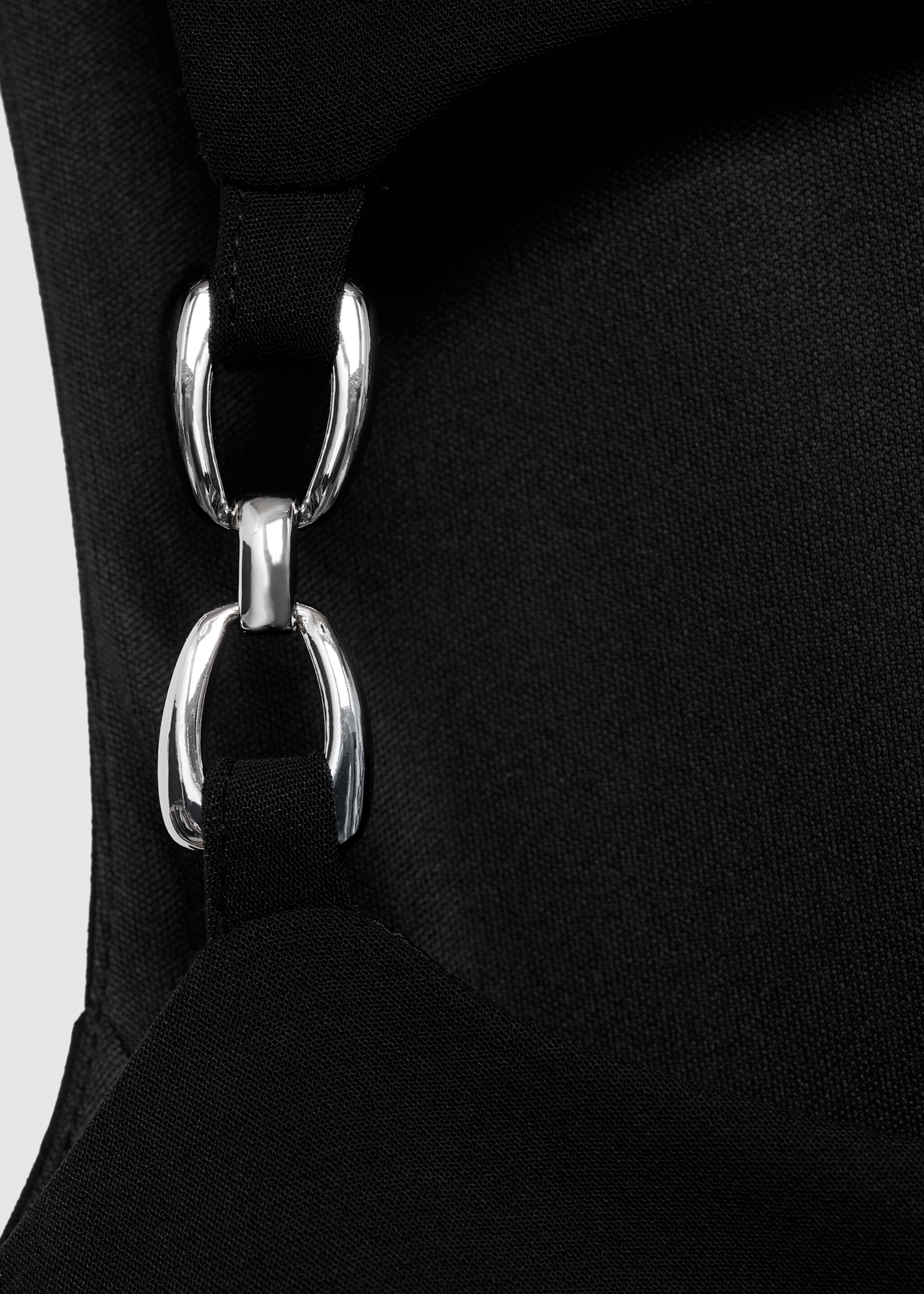 Jumpsuit with metallic detail opening - Details of the article 8, Black. Ref: 77089062-00.