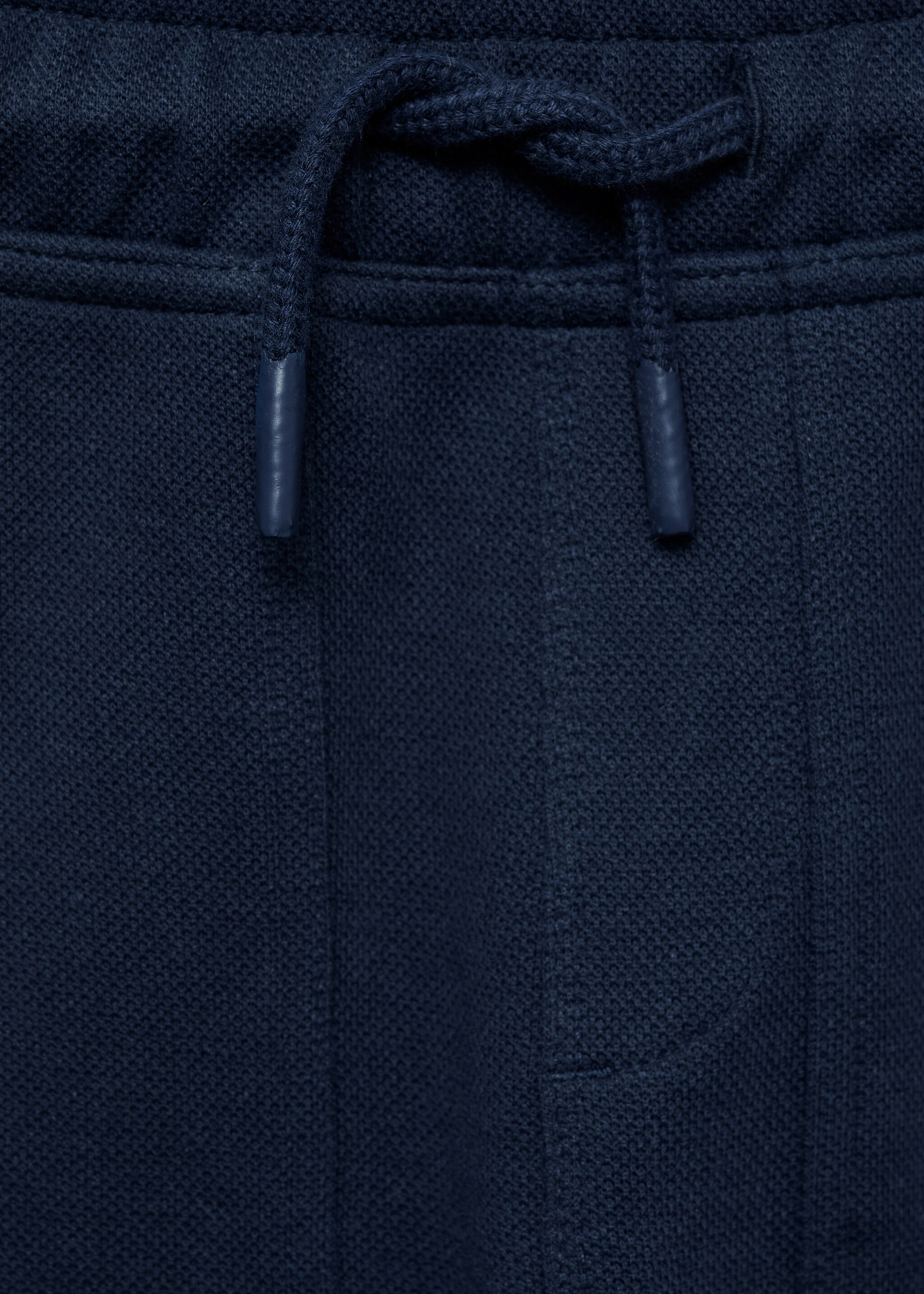 Cotton jogger-style trousers - Details of the article 8, Dark Navy. Ref: 77090377-00.