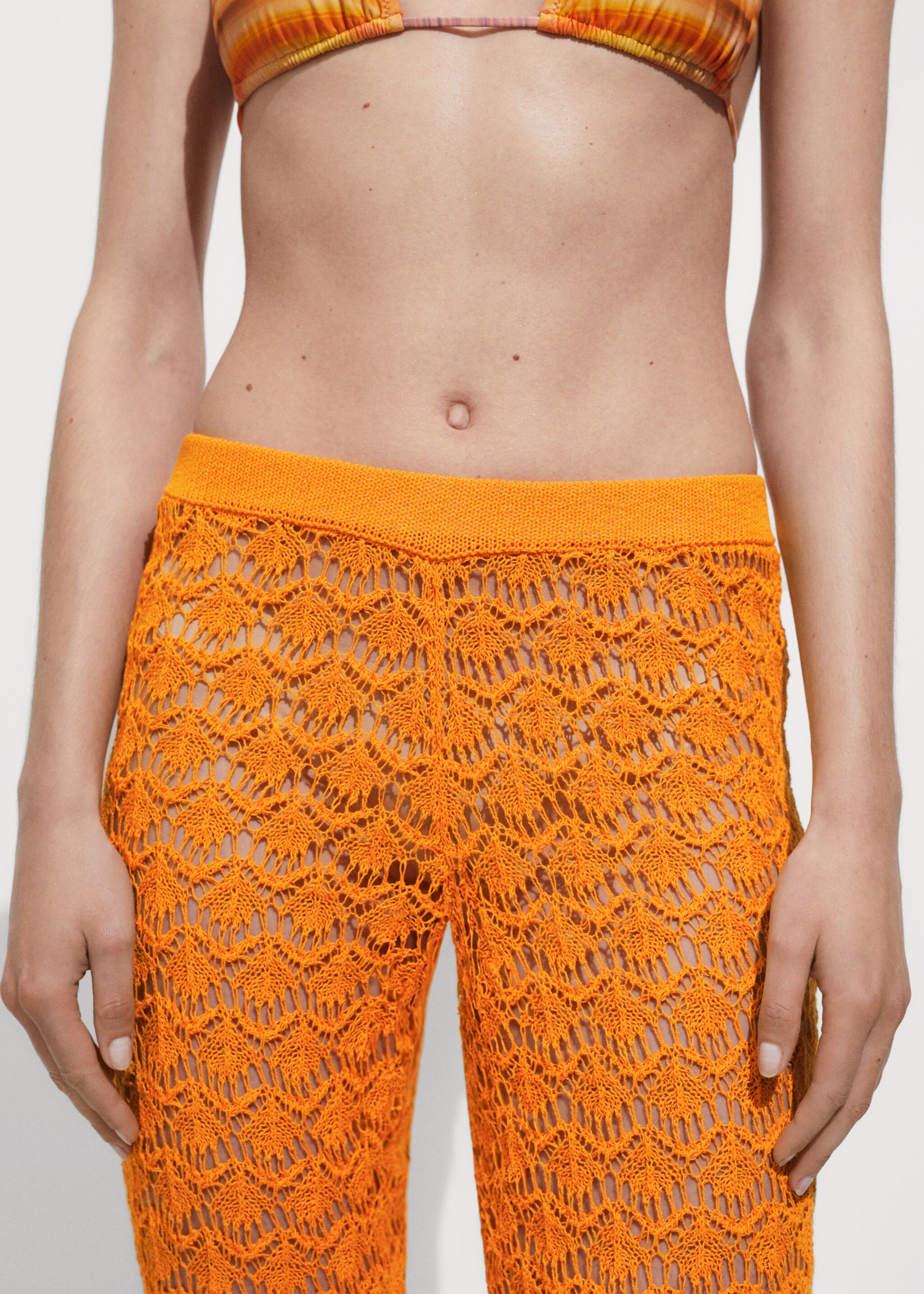 Pantaloni crochet flare - Piano medio