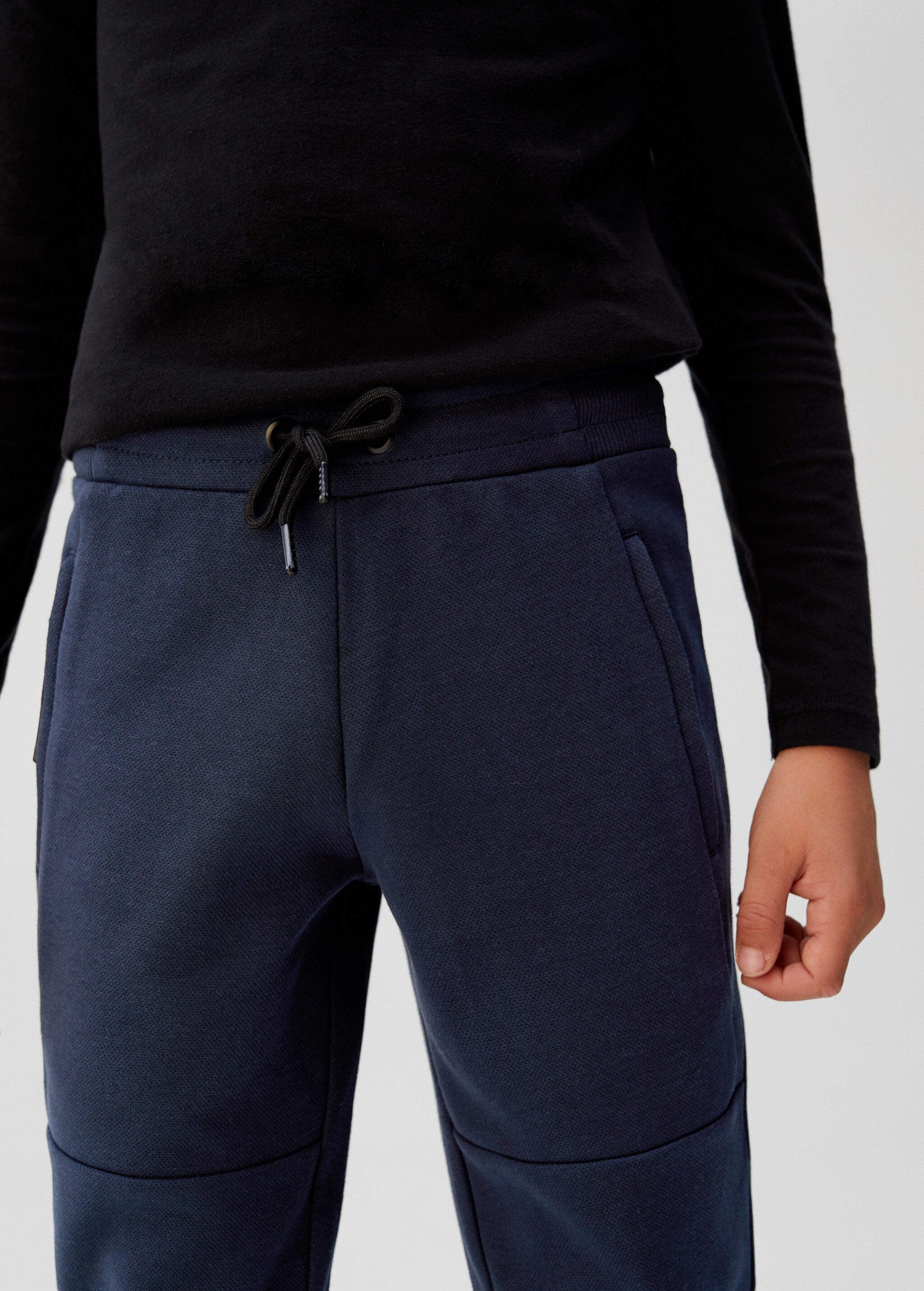 Bavlněné kalhoty jogger s kapsami - Detail zboží 2