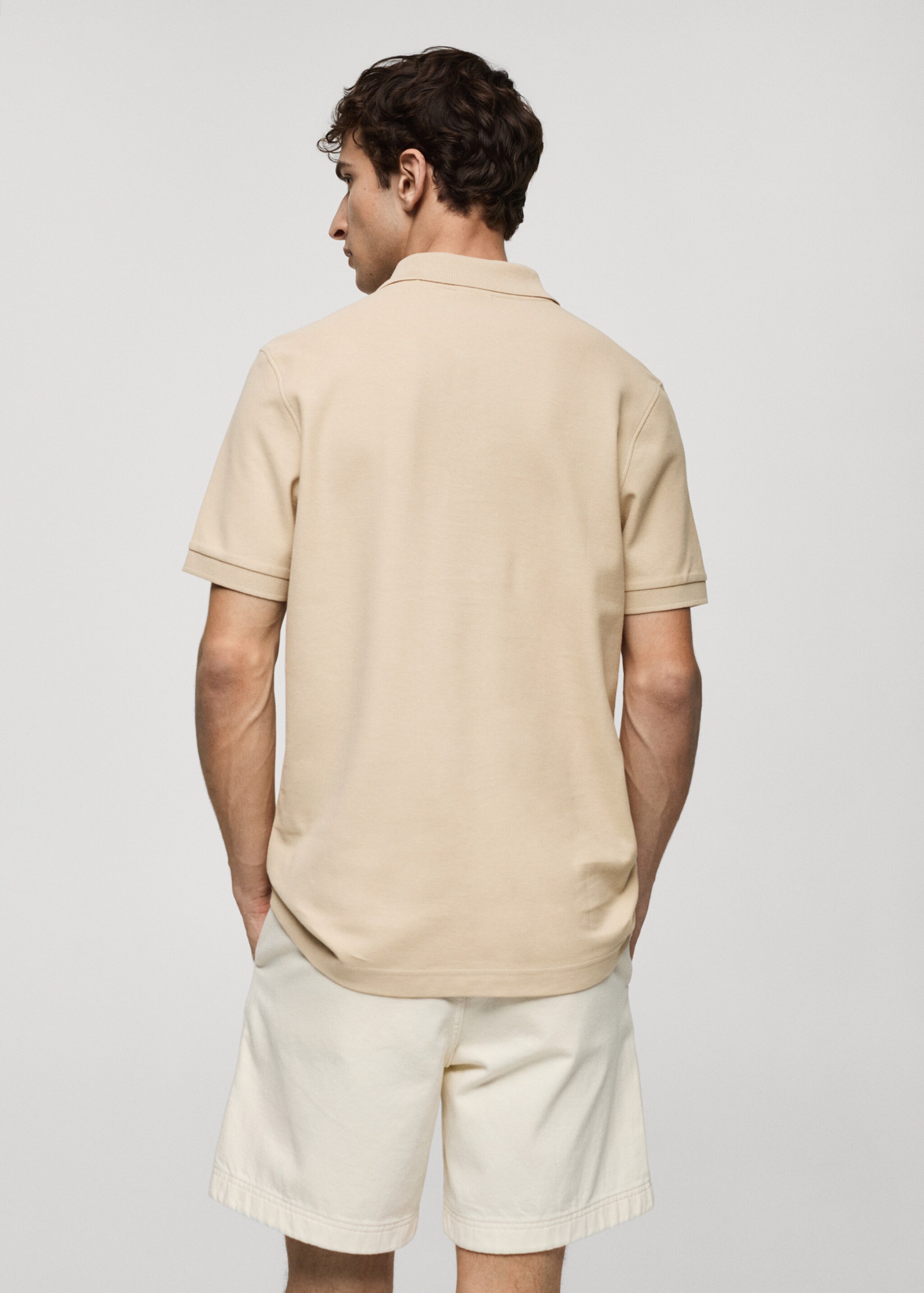 Polo de piqué de 100% algodão - Verso do artigo