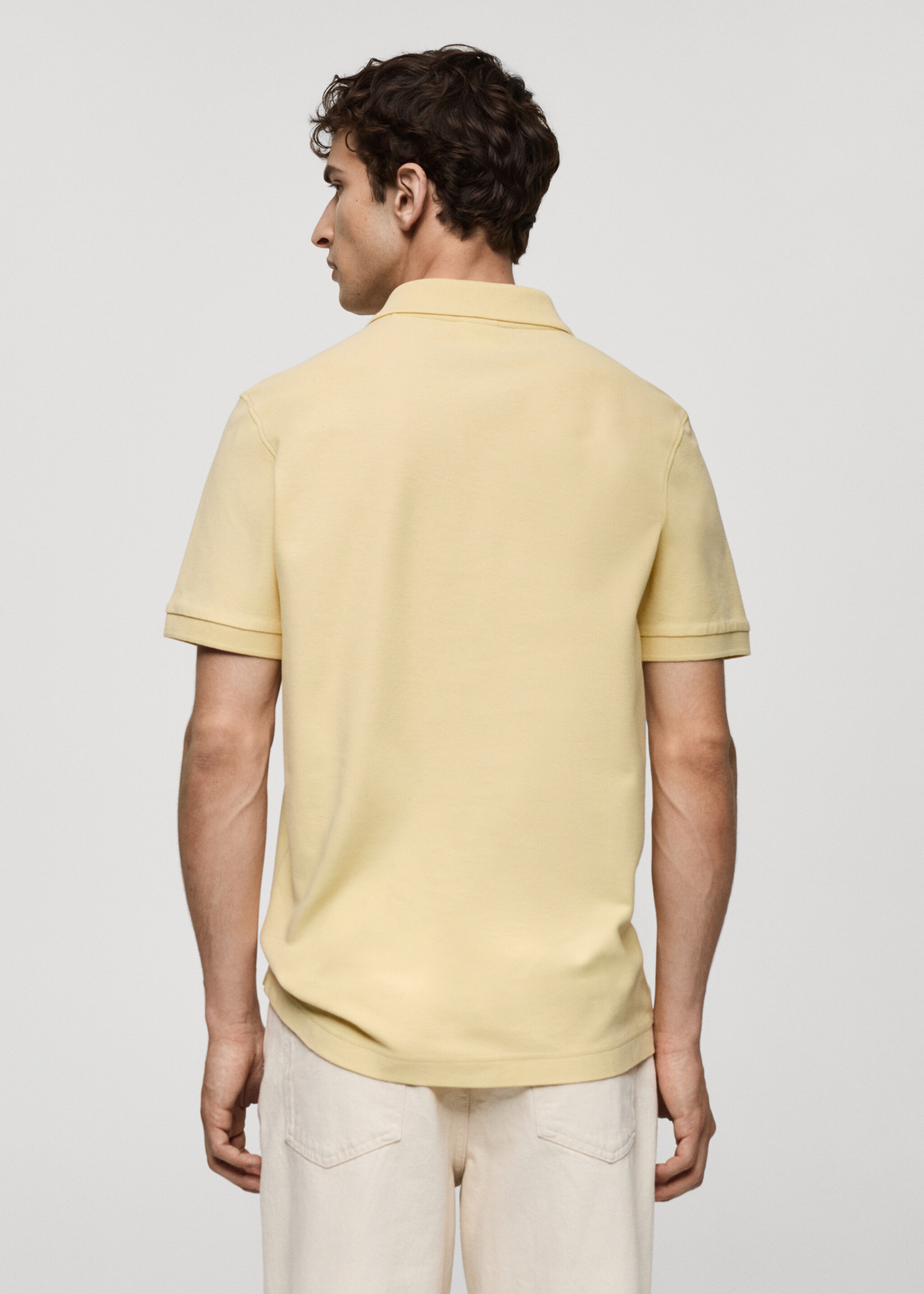 Poloshirt aus 100 %  Baumwoll-Piqué - Rückseite des Artikels