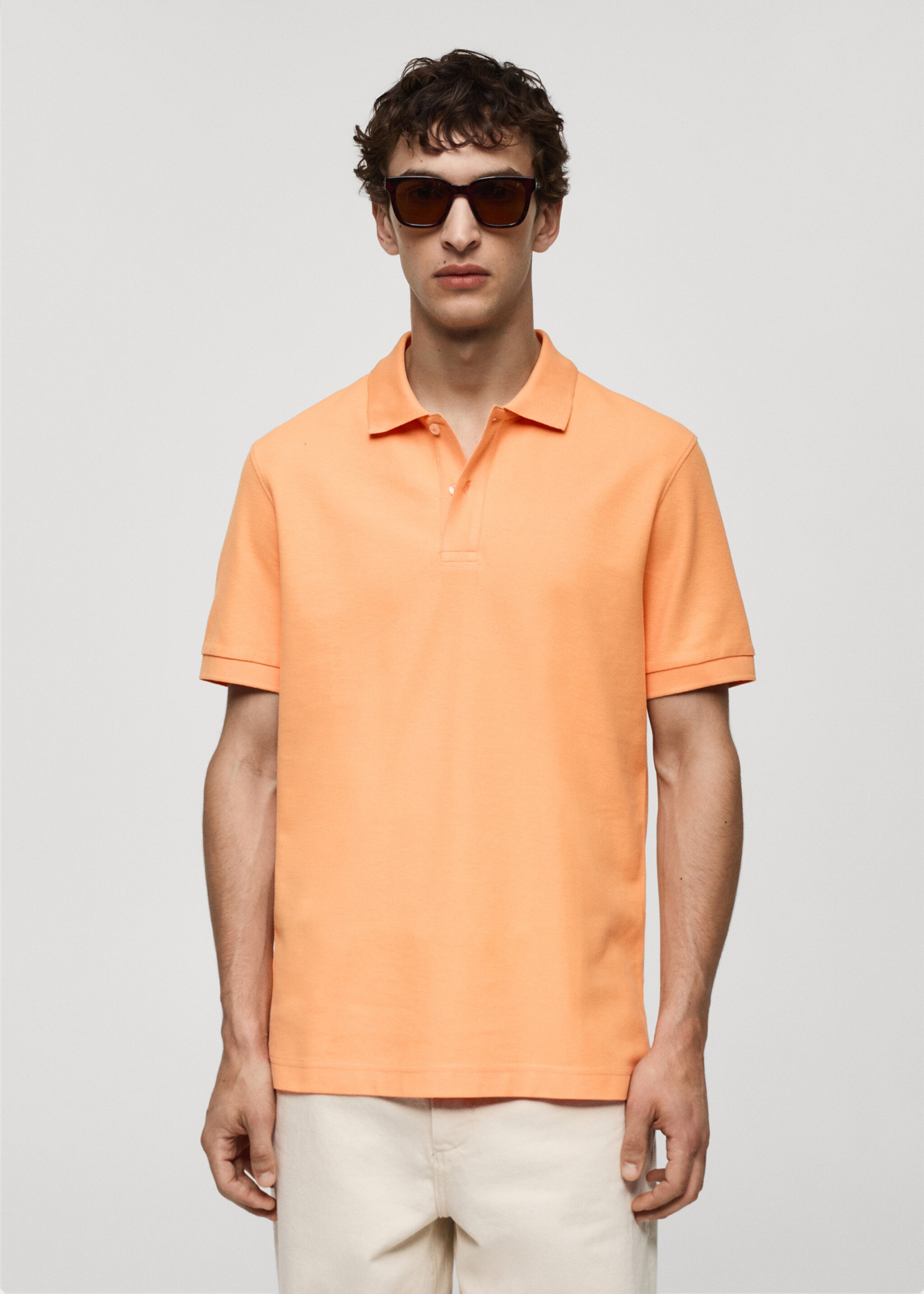 Polo 100 % piqué de coton - Plan moyen, Orange pastel. Ref: 77090584-00.