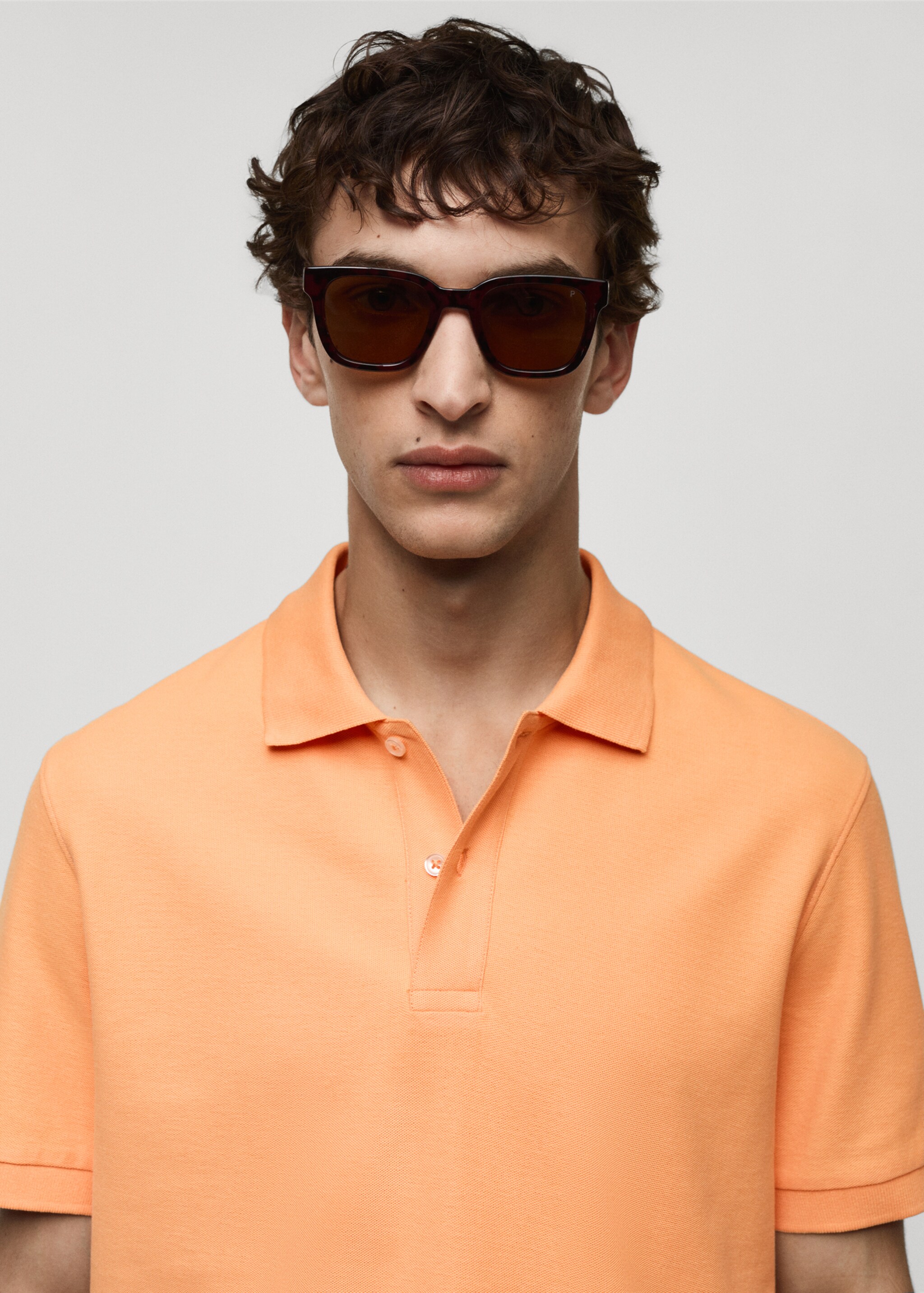 Polo 100 % piqué de coton - Détail de l'article 1, Orange pastel. Ref: 77090584-00.