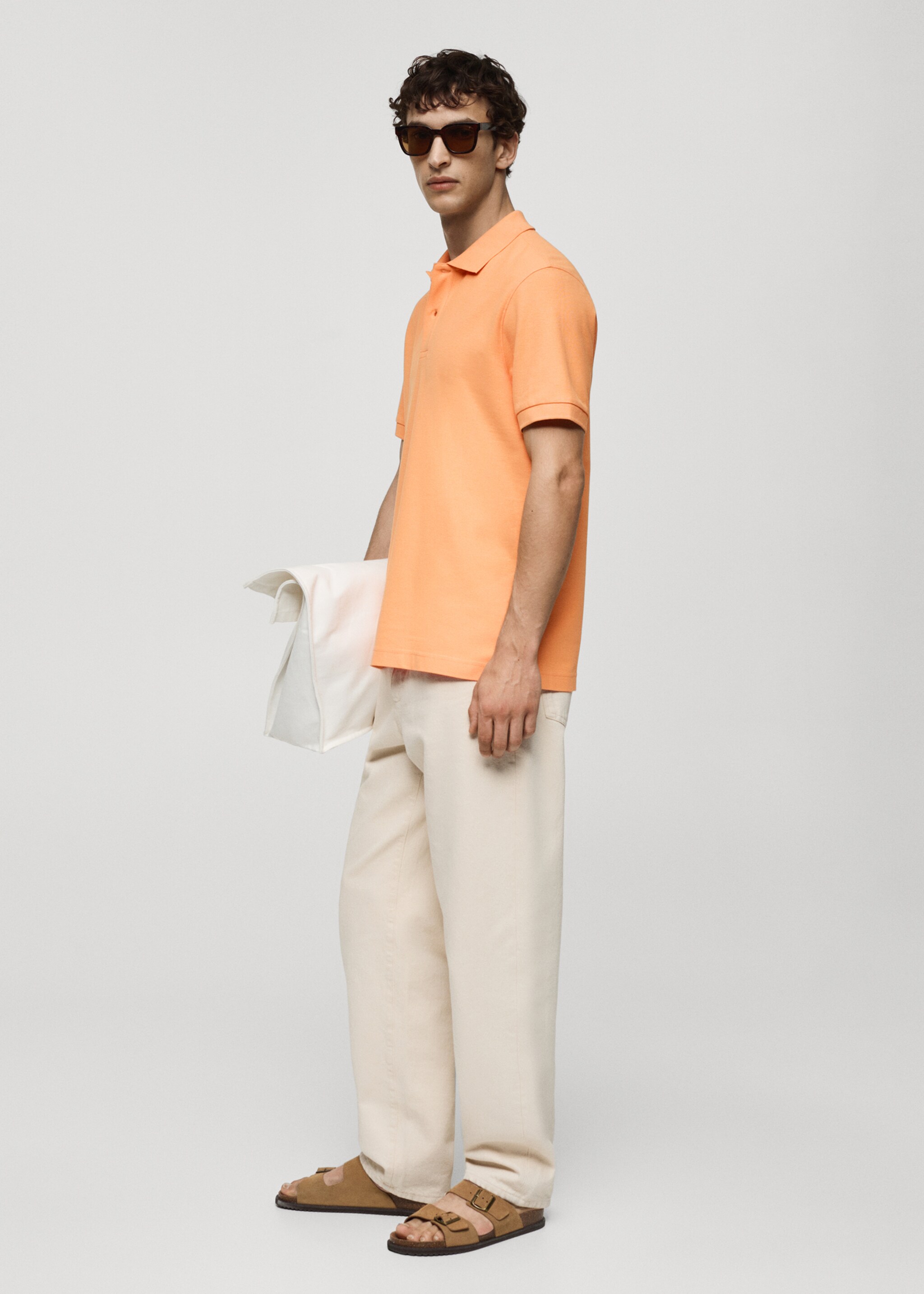 Polo 100 % piqué de coton - Détail de l'article 2, Orange pastel. Ref: 77090584-00.