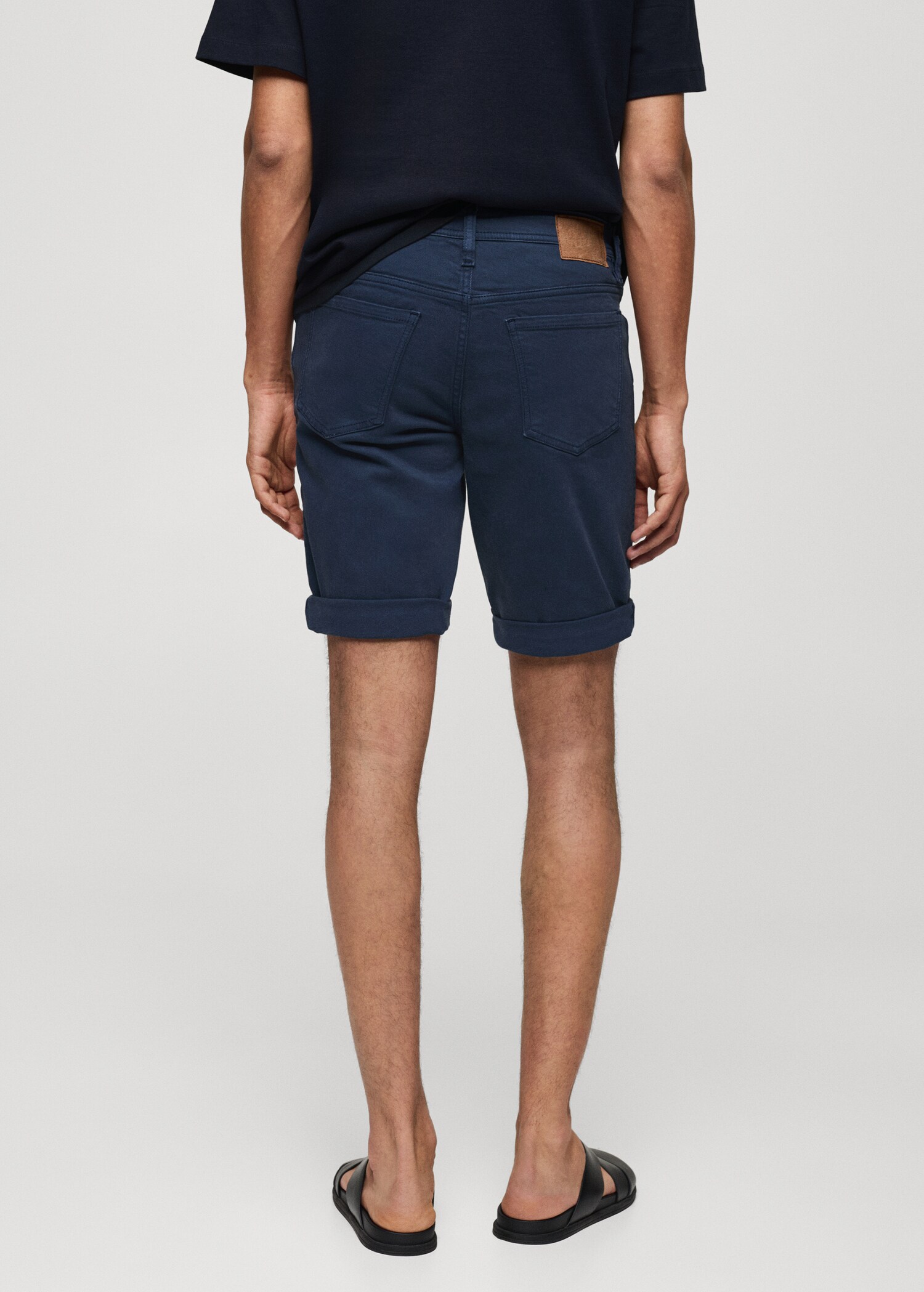 Slim-fit denim bermuda shorts - Reverse of the article
