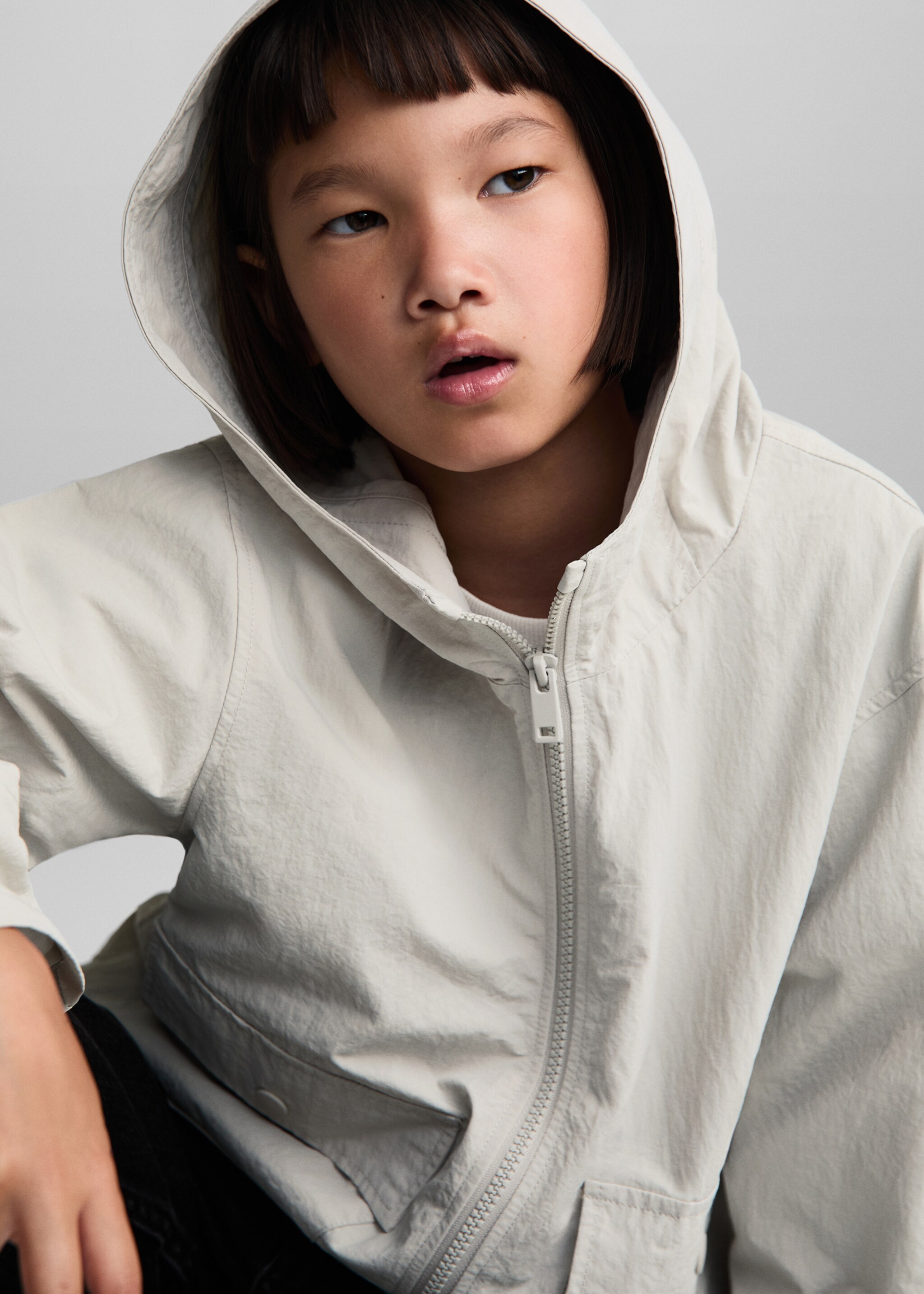 Raincoat hooded jacket - Details of the article 1, Grey. Ref: 77092540-00.